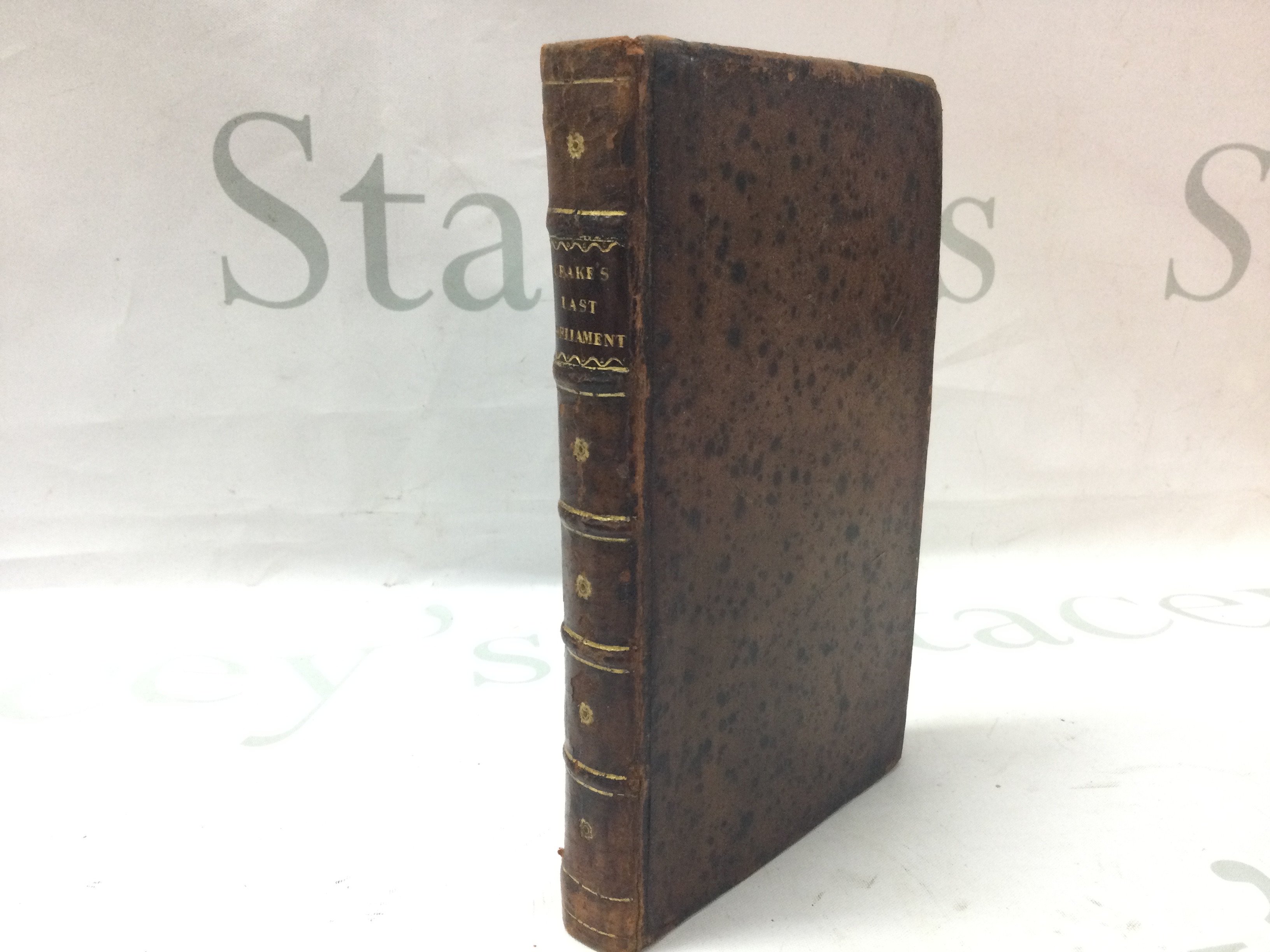 An antique leather bound 1702 History of the last parliament book by James Drake , London. Postage category B