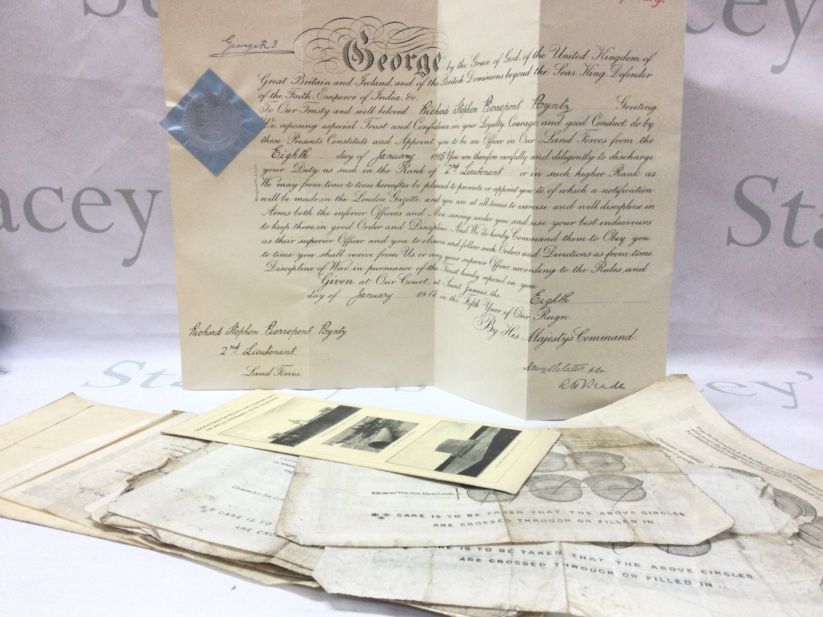 A collection of 1870s/1880s merchant marine discharge certificates (14) with a WW1 military commission signed by King George V. Postage category B