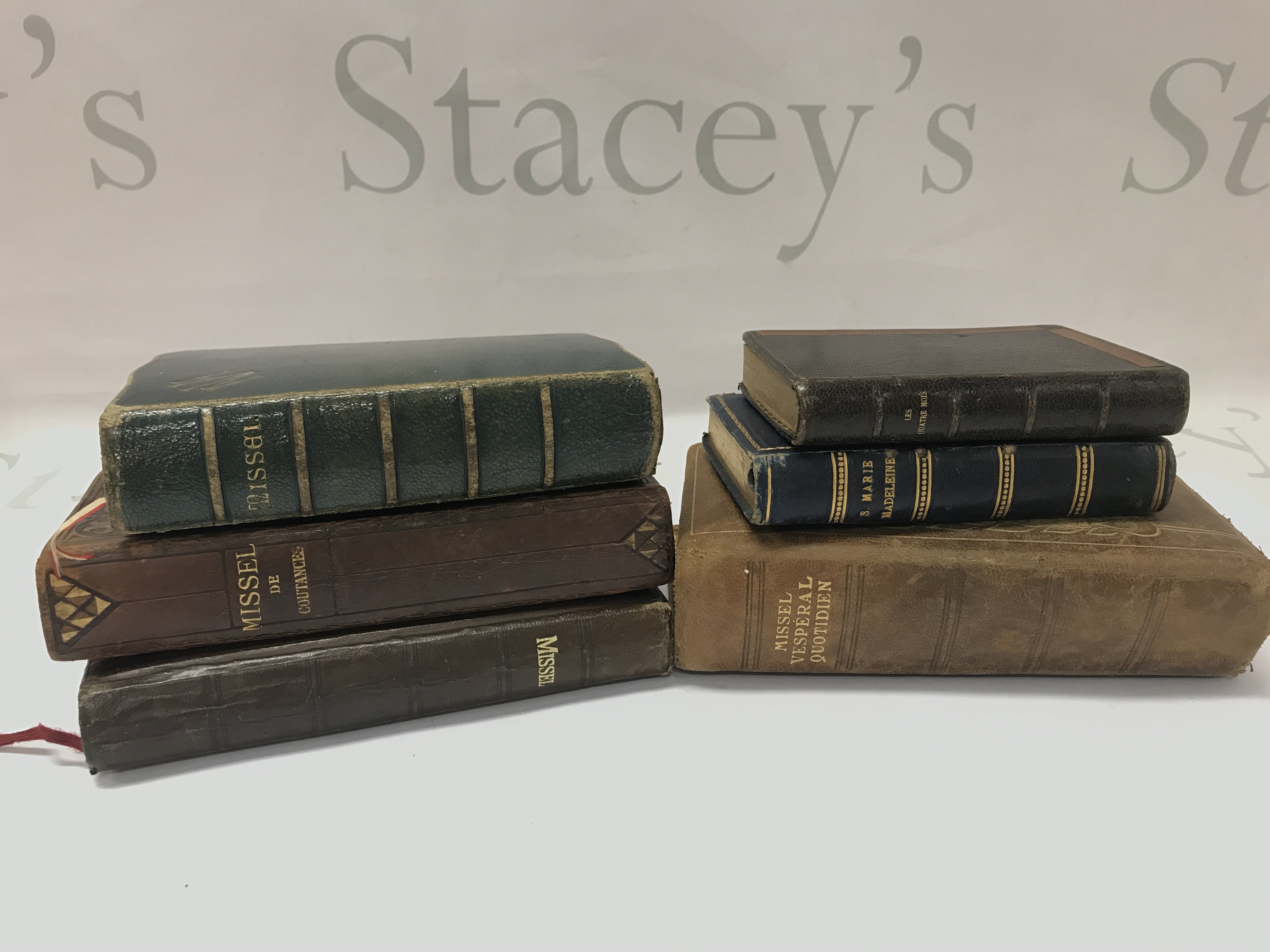 Late 19th/ 20th century French bibles and Missal books including miniature leather bound examples. . Postage category B