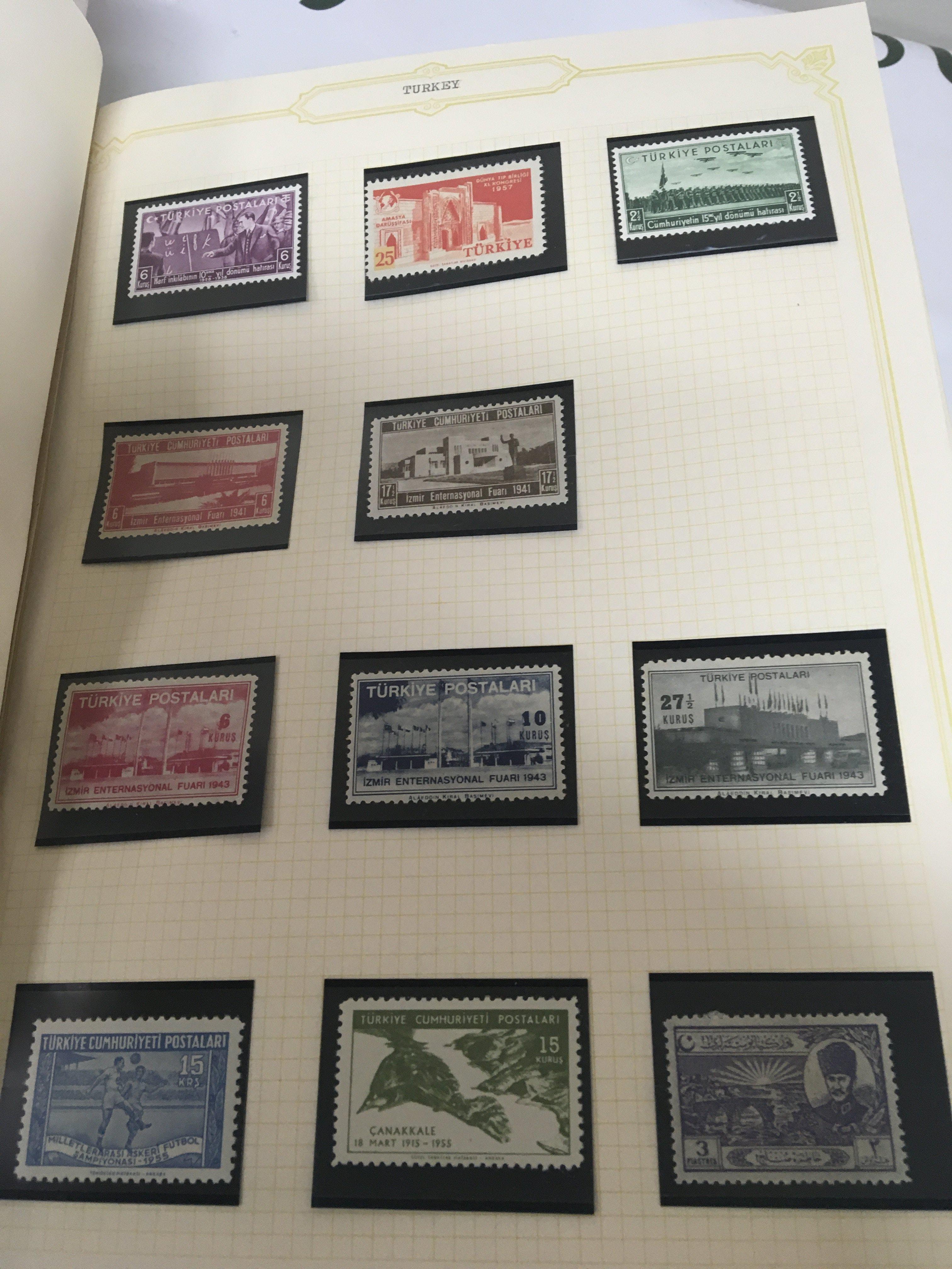 Nine Albums containing world stamps including some 19th century stamps. Turkey Canada Bermuda including unused Four blocks of George VI stamps. Indian states Chamba China Transvall and others.