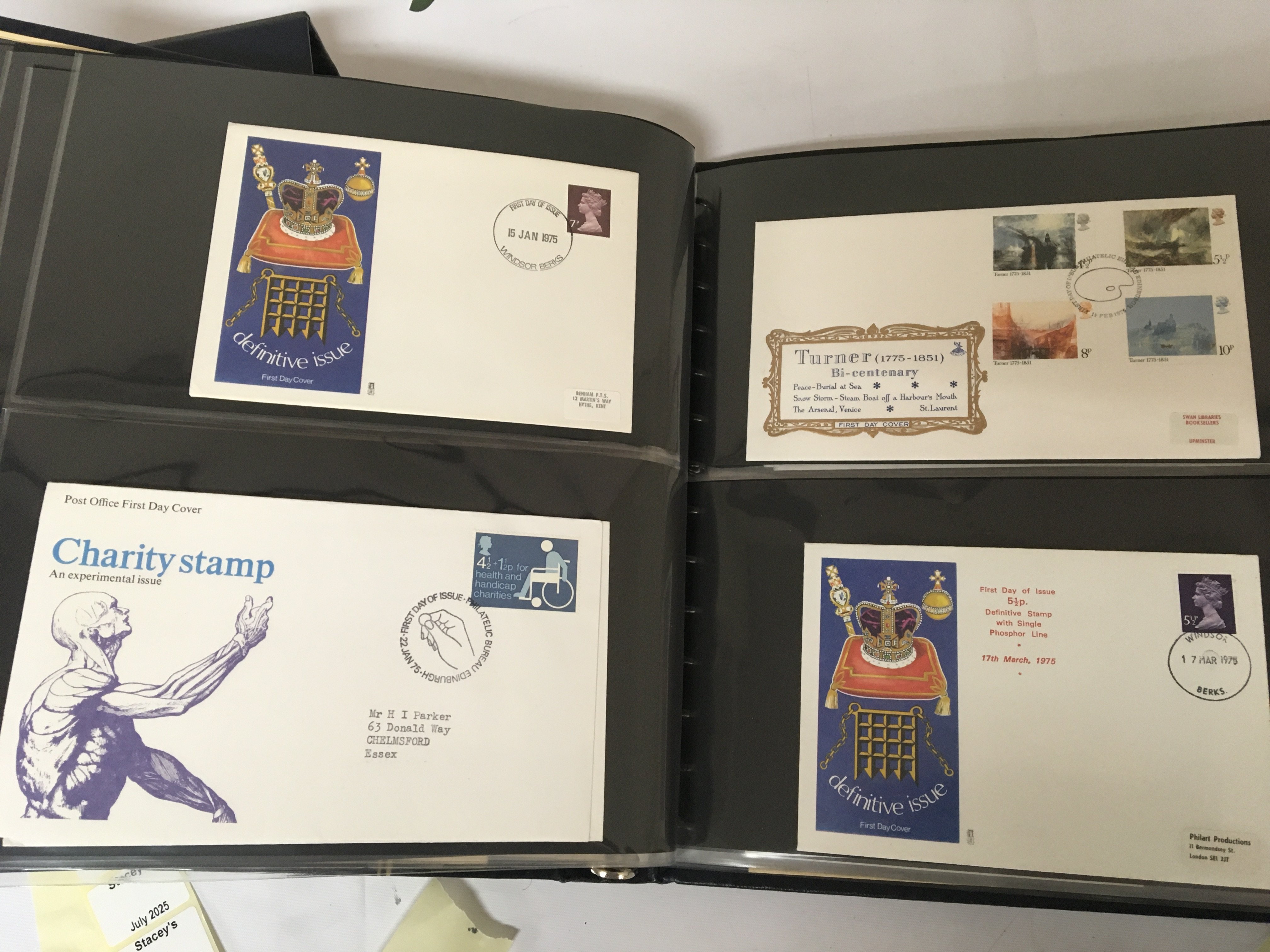 A box containing a collection of well presented first day covers in albums including Channel Islands.