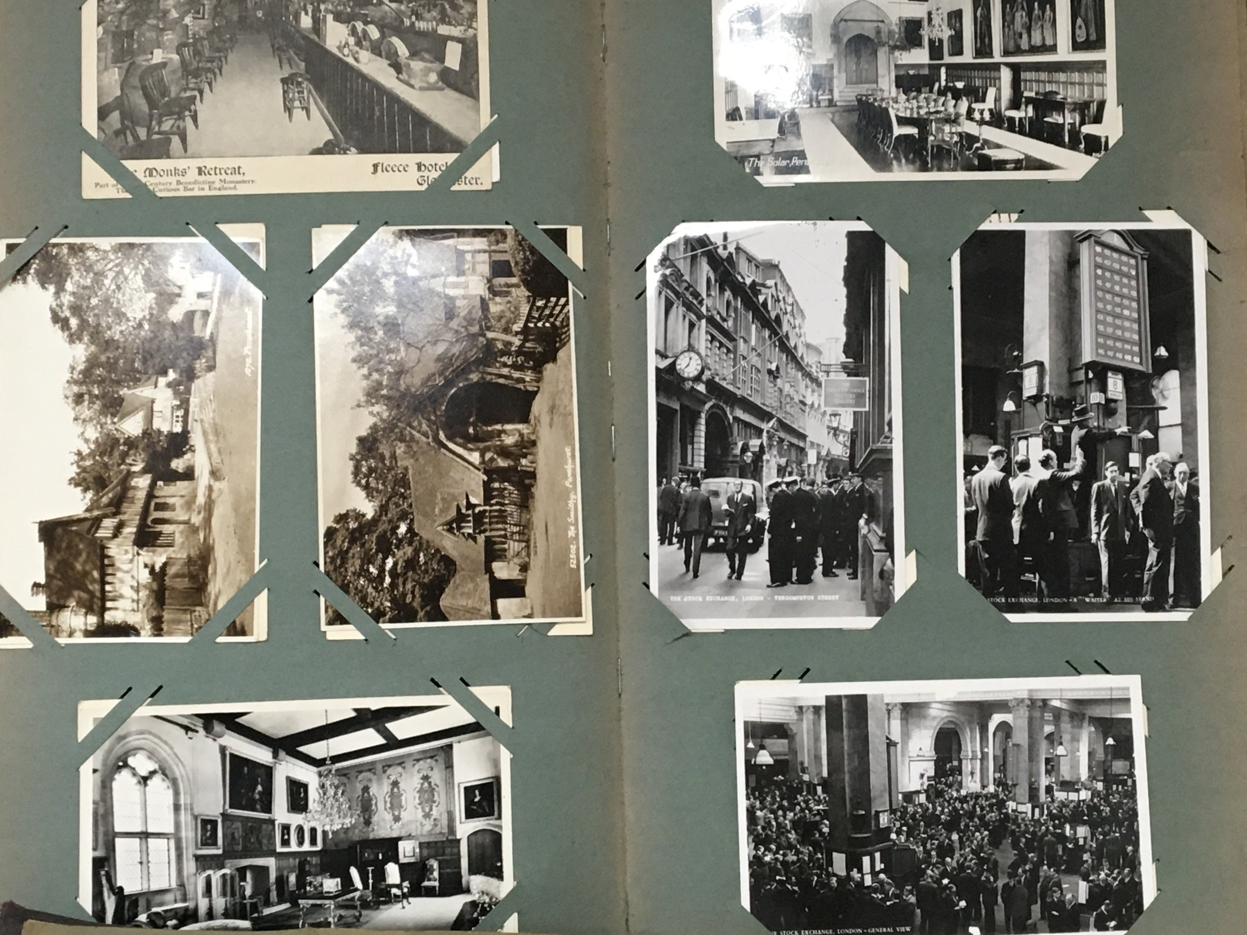 A collection of five albums of Vintage postcards including views of the London stock exchange and numerous other black and white and early coloured postcards (5)