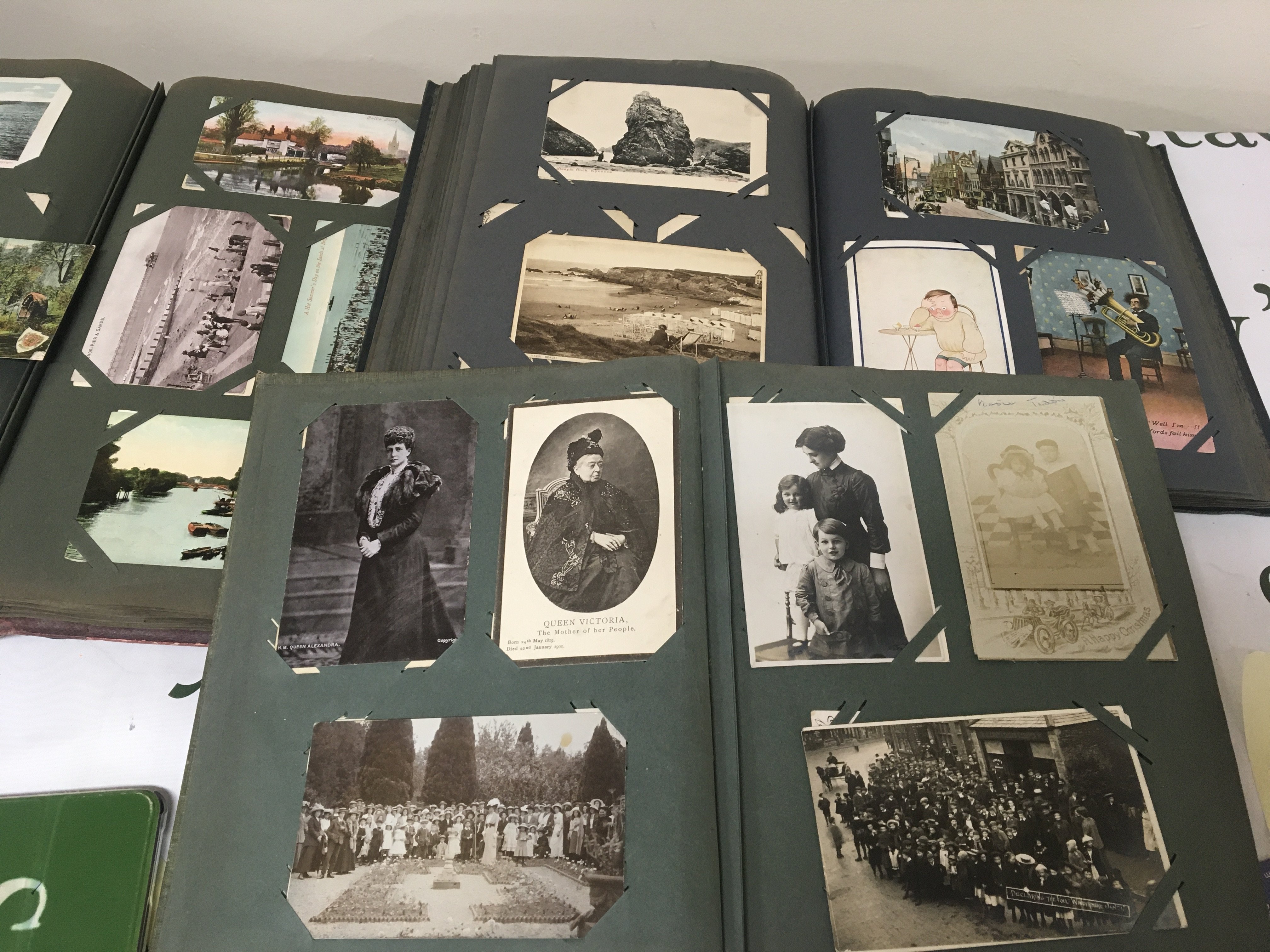 Three albums containing a comprehensive collection of Vintage post cards including social History comical cards places and landmark (3)