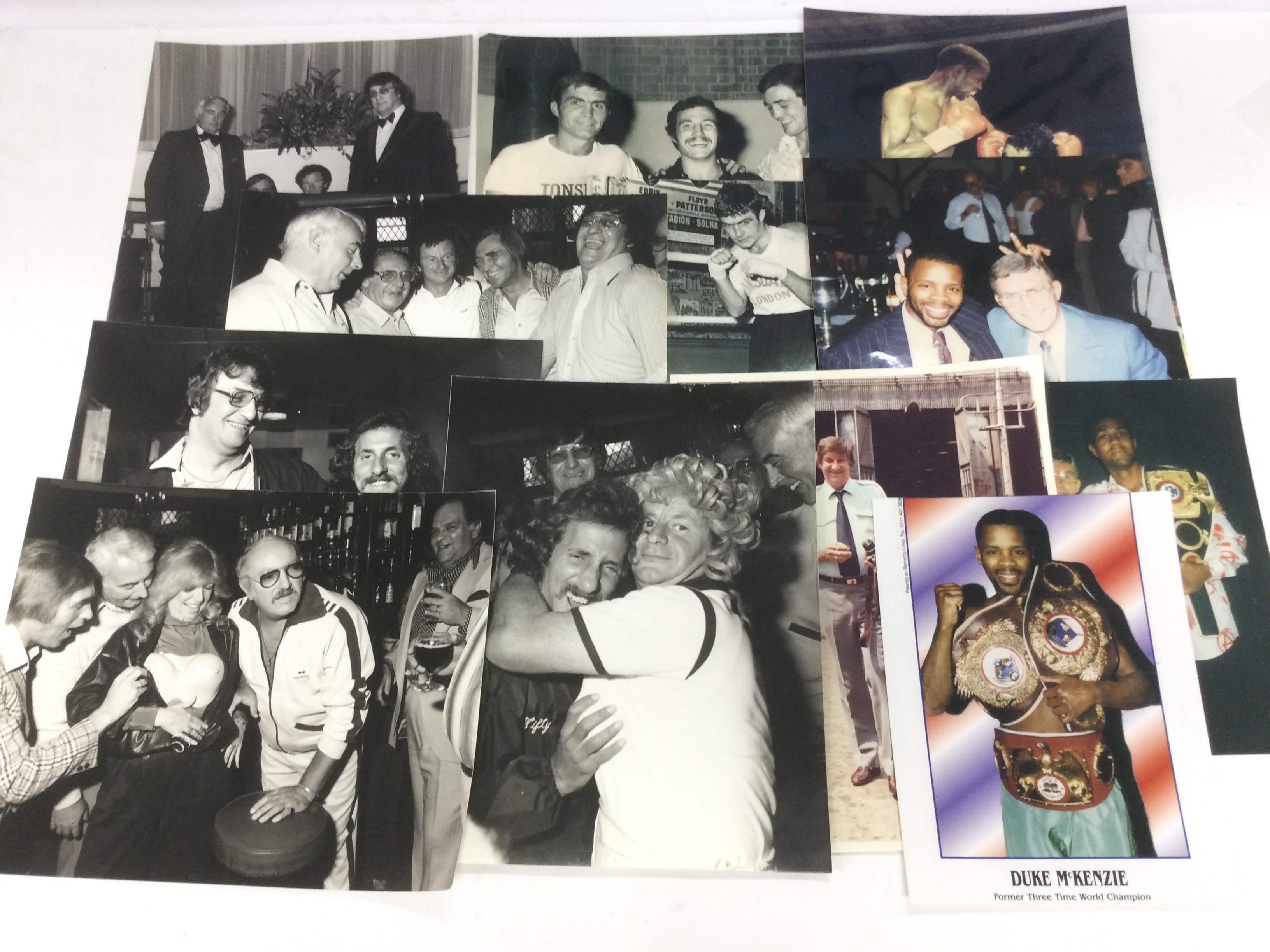 A collection of sports press photographs and signed ephemera by various names including