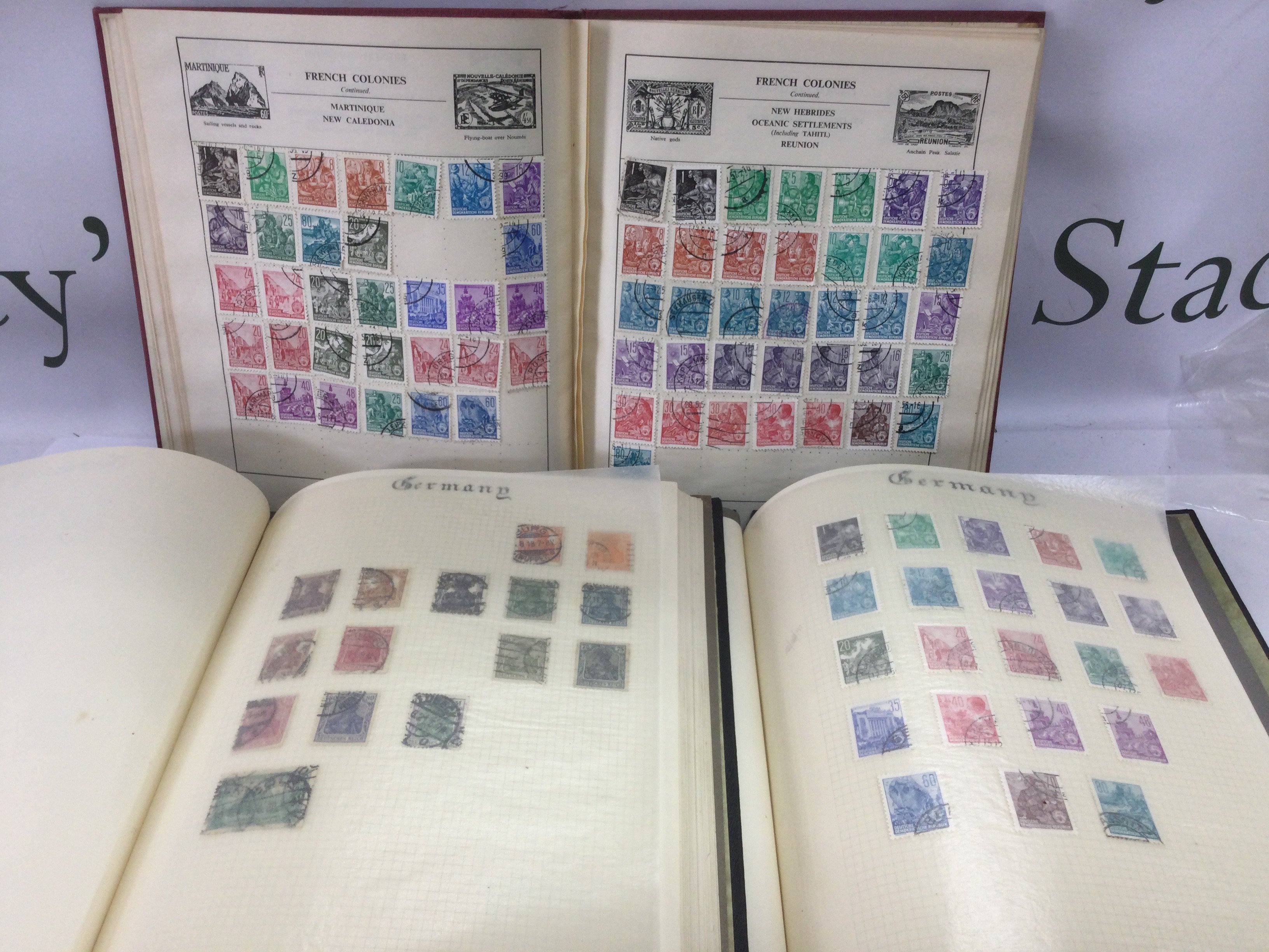 Eleven albums of world stamps. Shipping category D.
