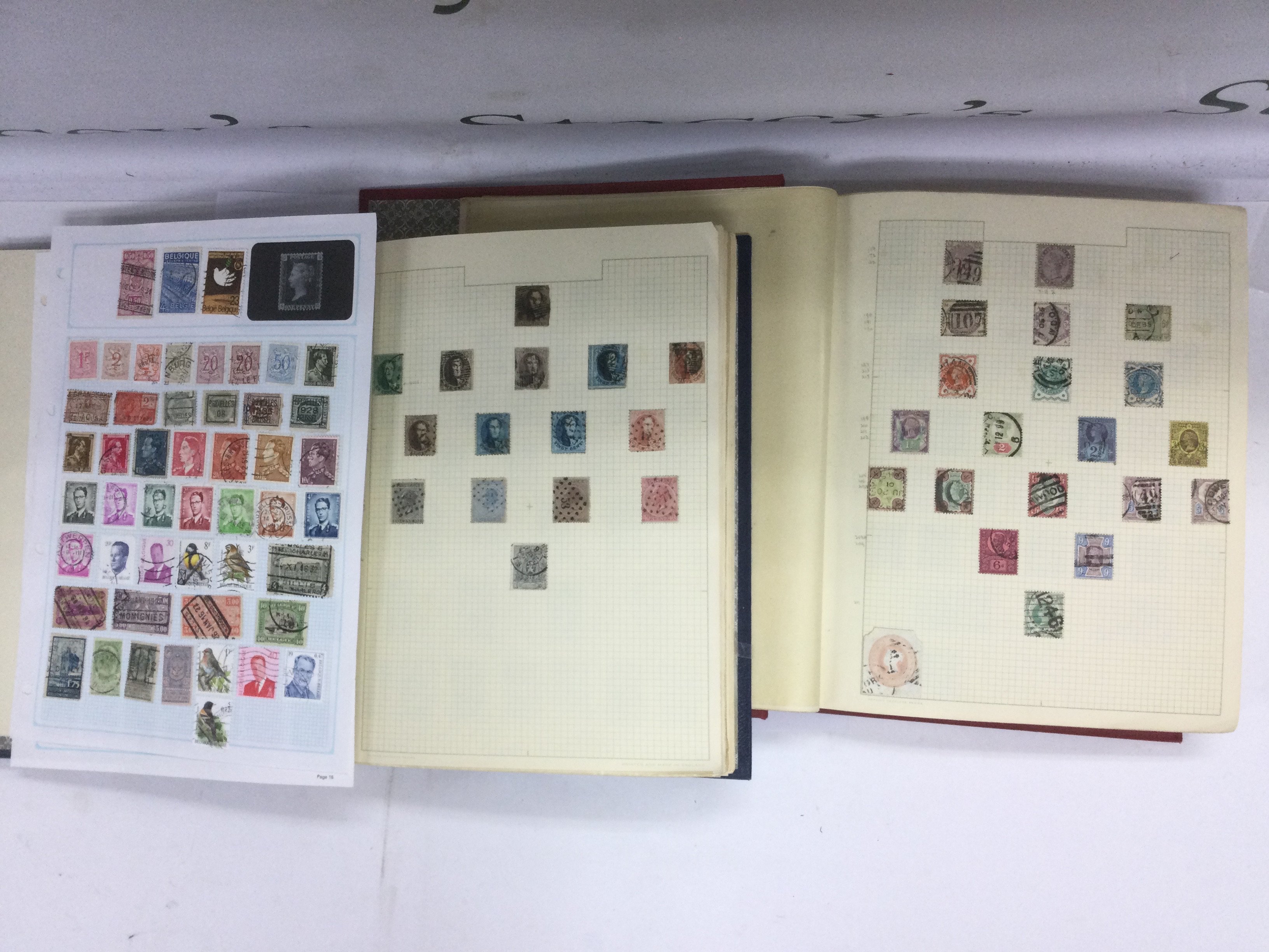 Seven albums of world stamps. Shipping category D.