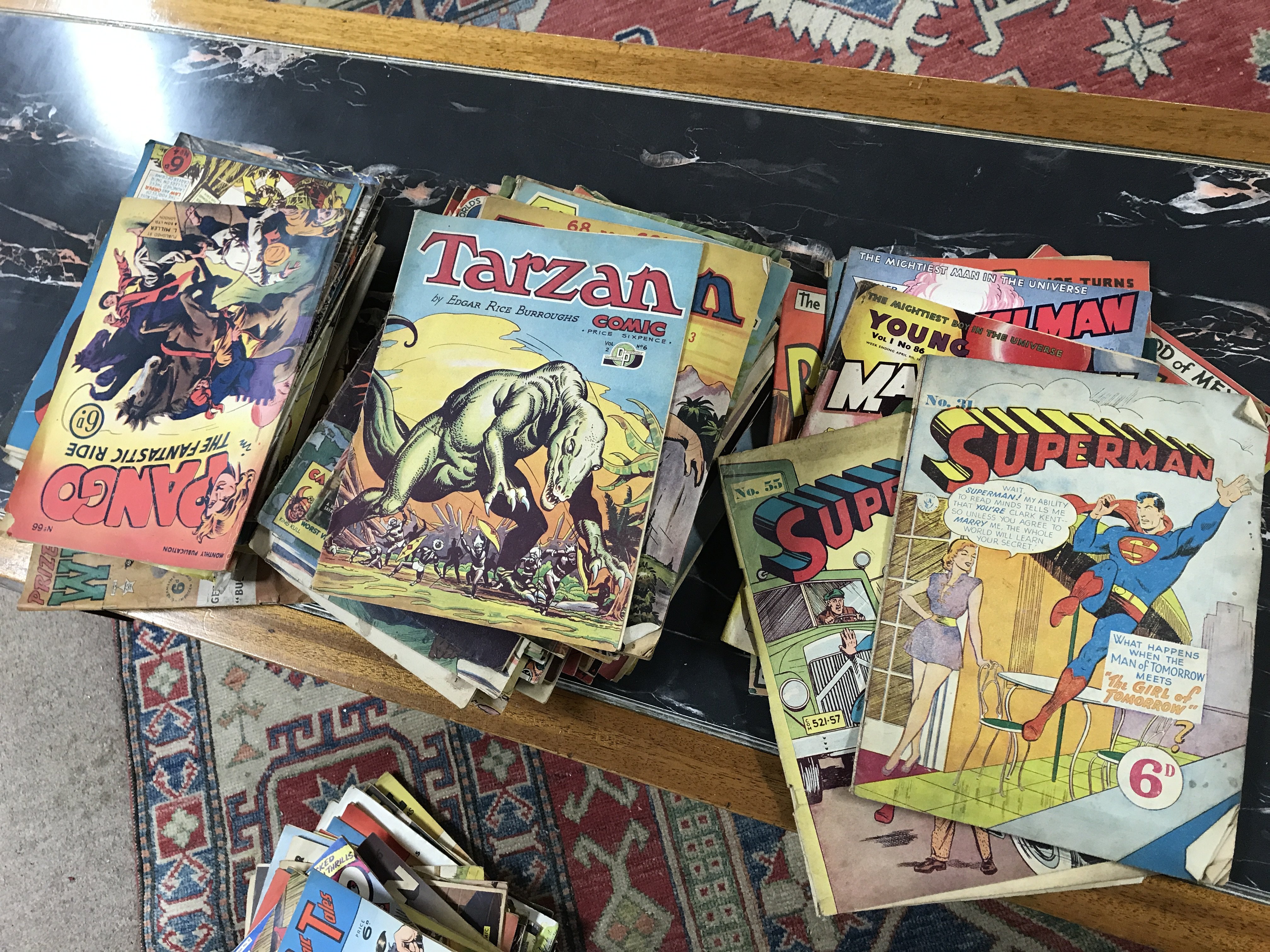 Vintage comic books including Superman no 31 , no 55, Marvelman, The Cisco Kid, Tarzan, Billy the Kid etc.