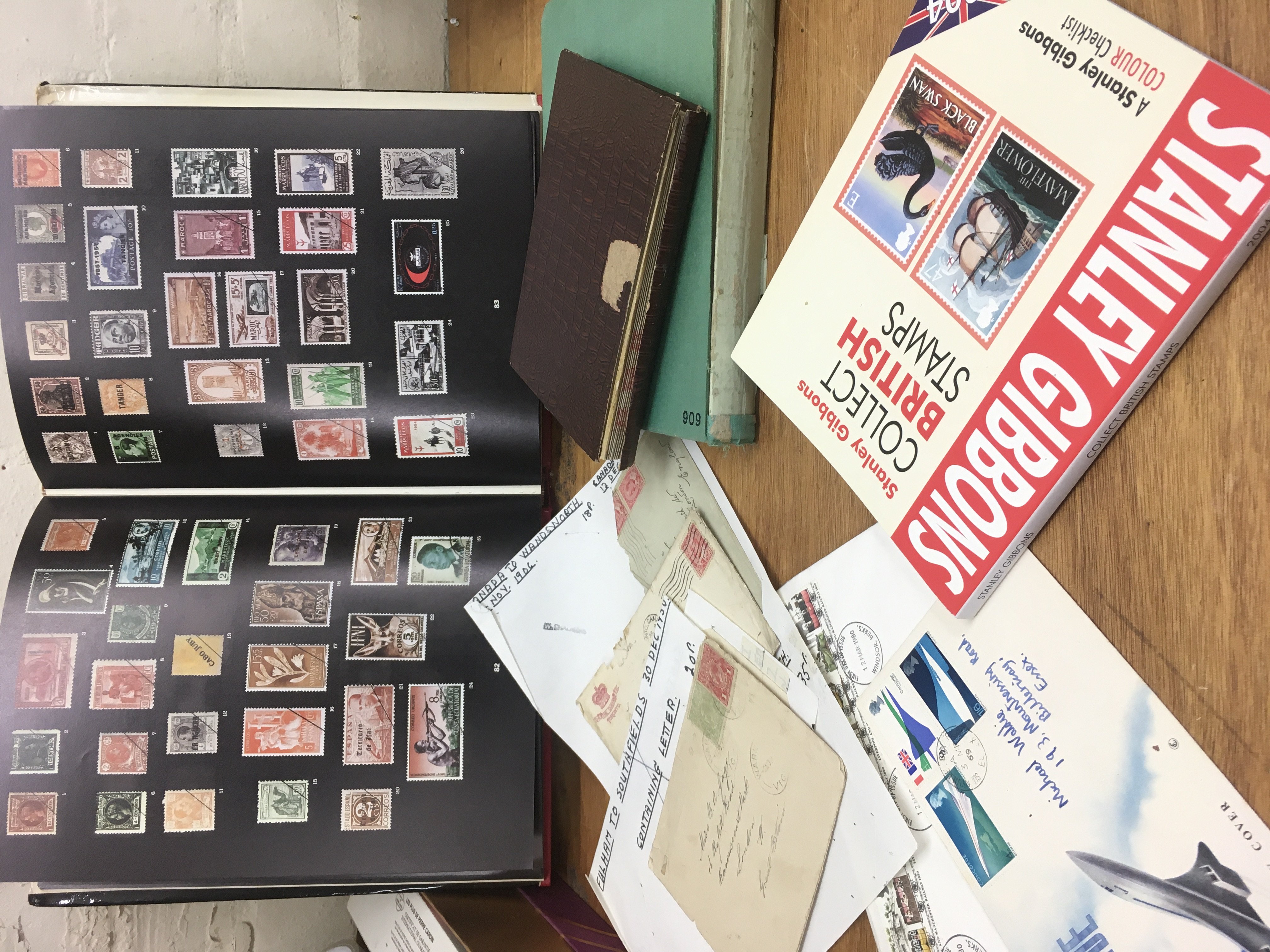 Stamp books, early 20th century letters and two albums . No reserve . Postage category B