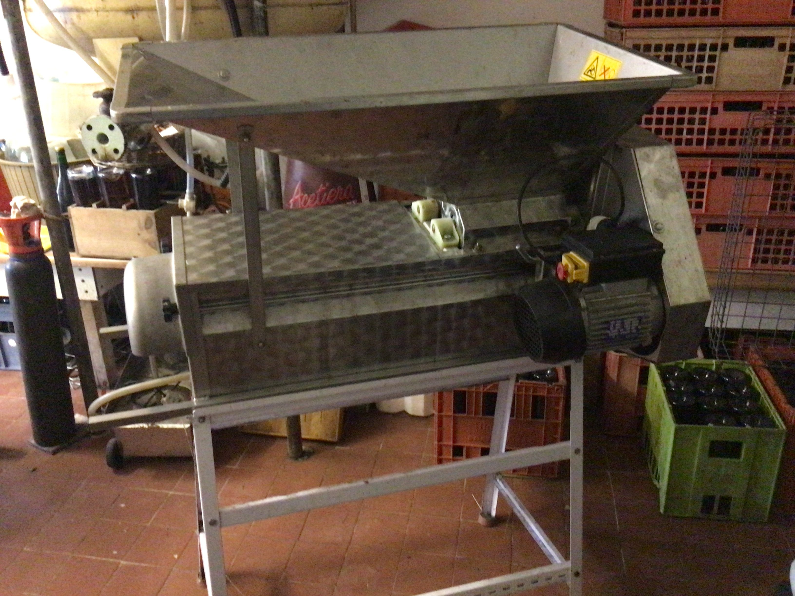 A Galvanised grape masher with stalk extractor electric operated seen working. Viewing by appointment sold in situ buyer to collect.