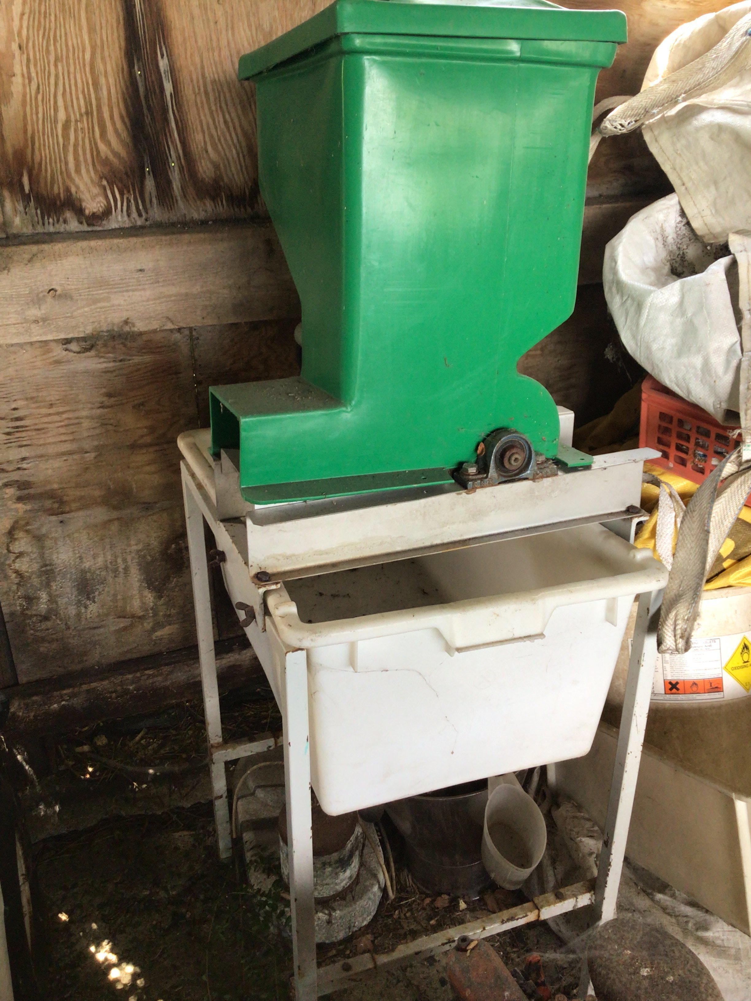 An Electric Apple Harvesting masher ideal for large scale home brew or micro brewery Cider making with plastic tank and metal stand. Viewing by appointment sold in situ buyer to collect Billericay CM11.