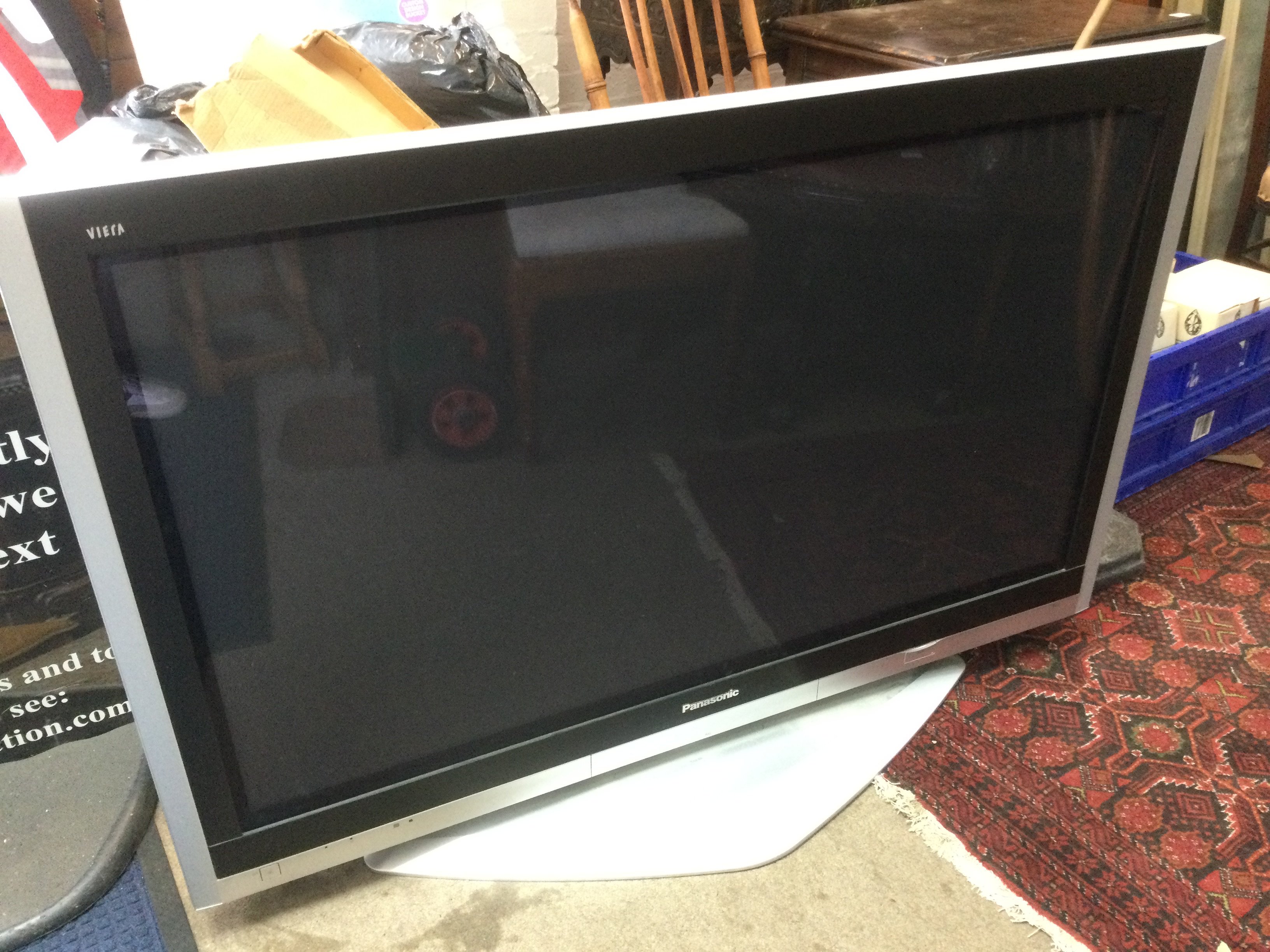 A 50" Panansonic plasma TV with remote control. Shipping category D.