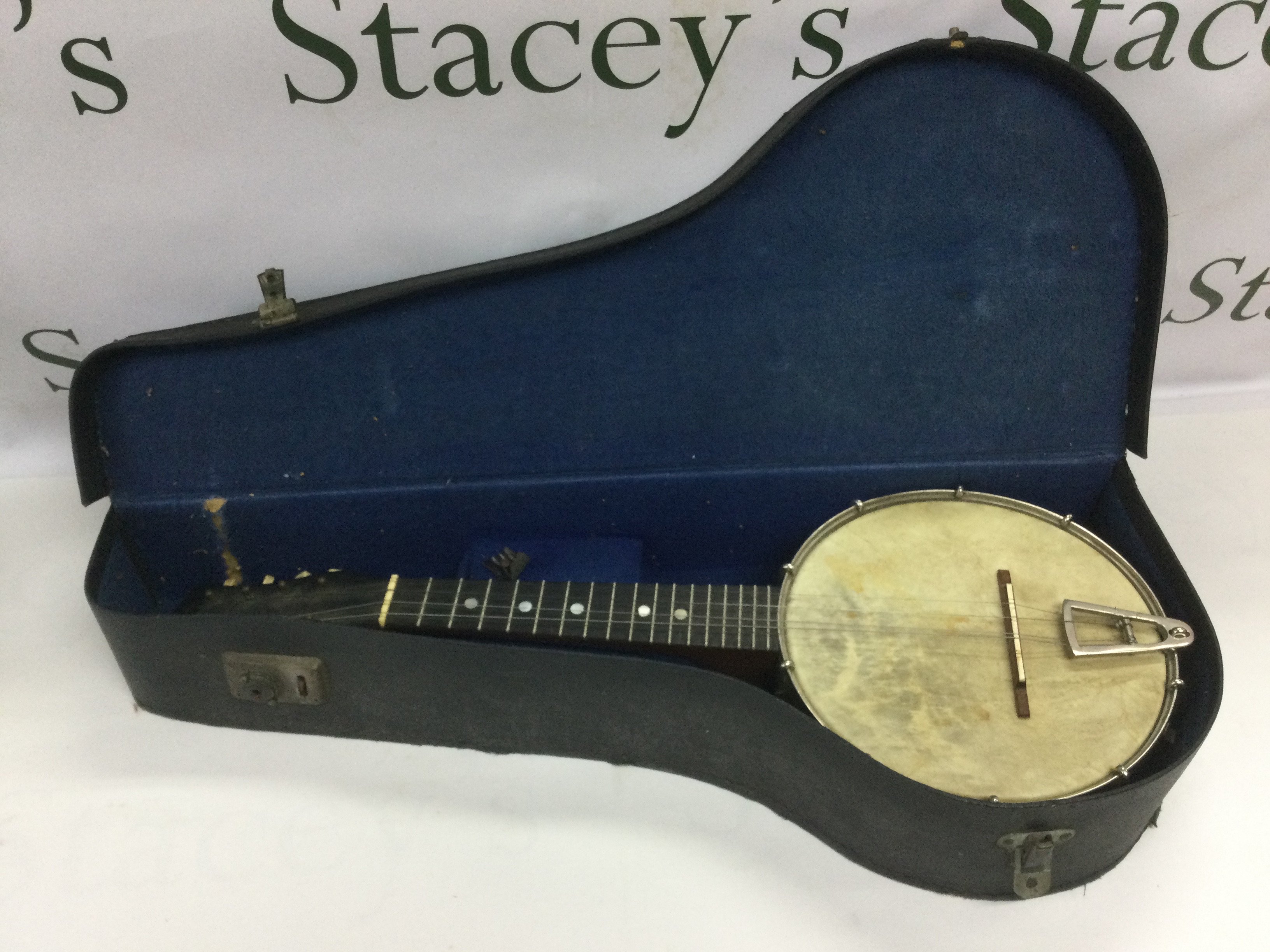 A circa 1920s open backed banjolin. Shipping category C.