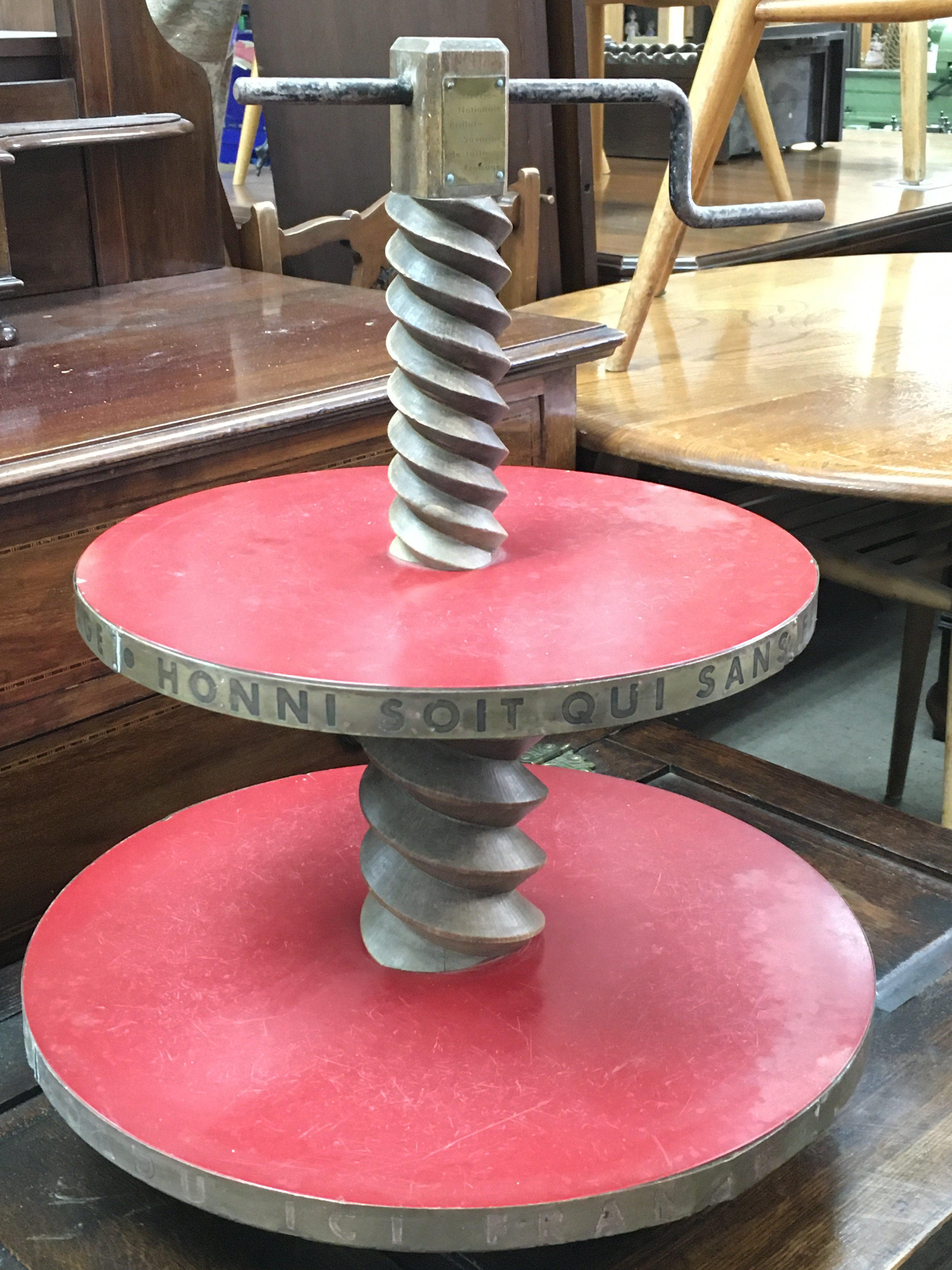 A vintage French Confrerie Nationale competition cheese display stand with interesting engraving around sides- shameful be he who without cheese pretends to pay homage to a good table. 50cm tall