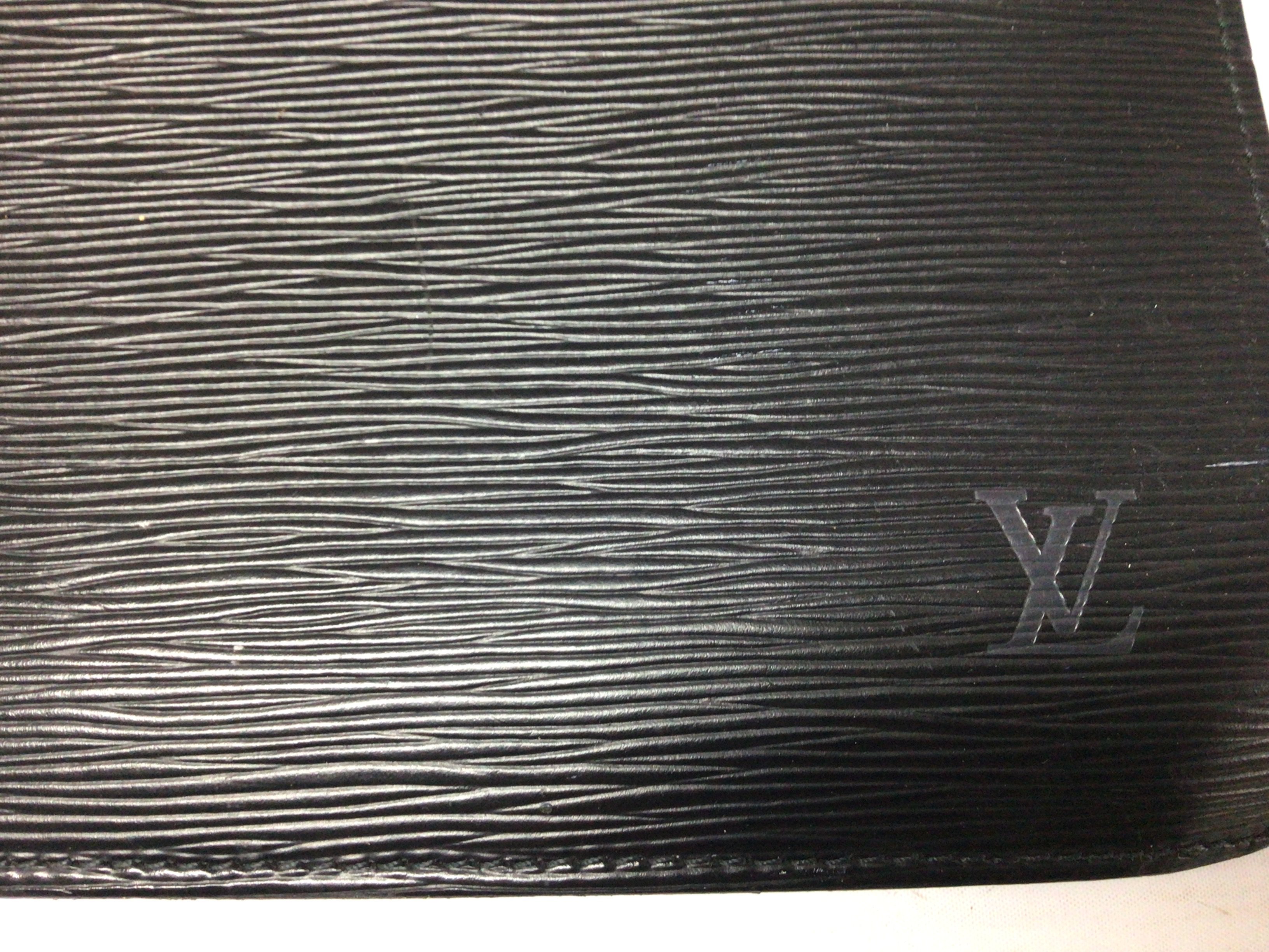 A Louis Vuitton brief case