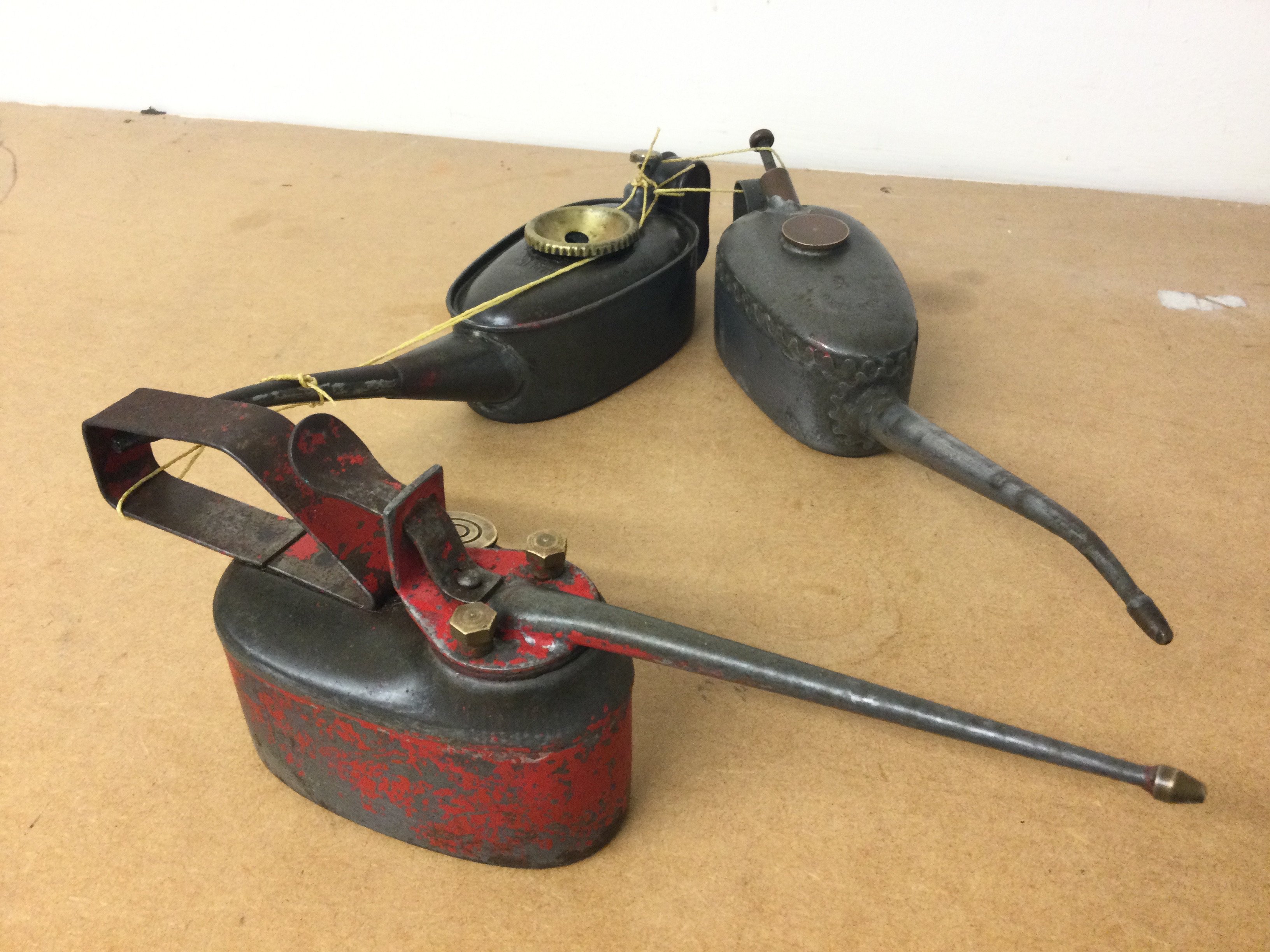 Three vintage oilers with brass lids , postage category B