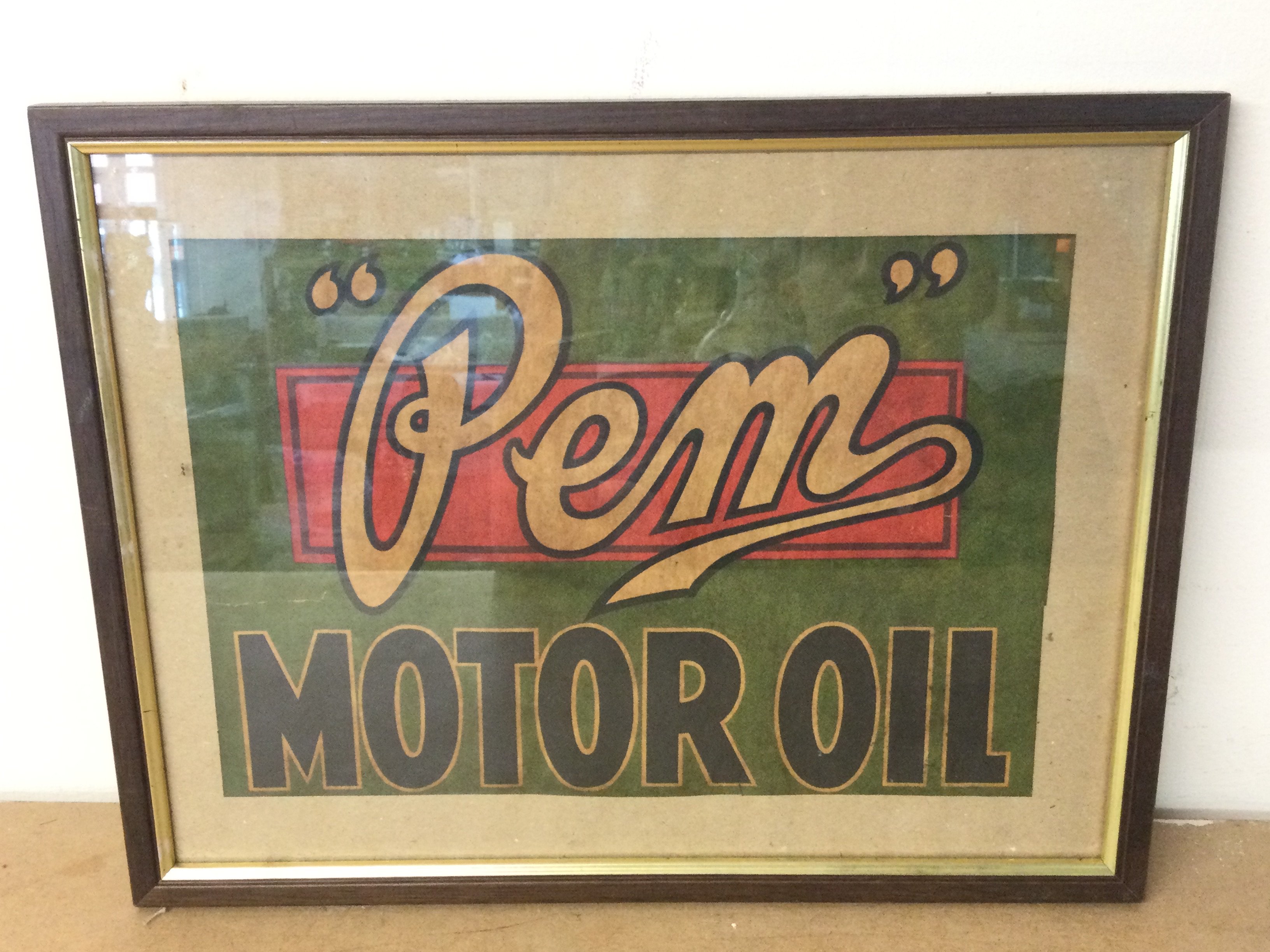 A framed and glazed advert for Pem motor oil, dimensions 36x28cm