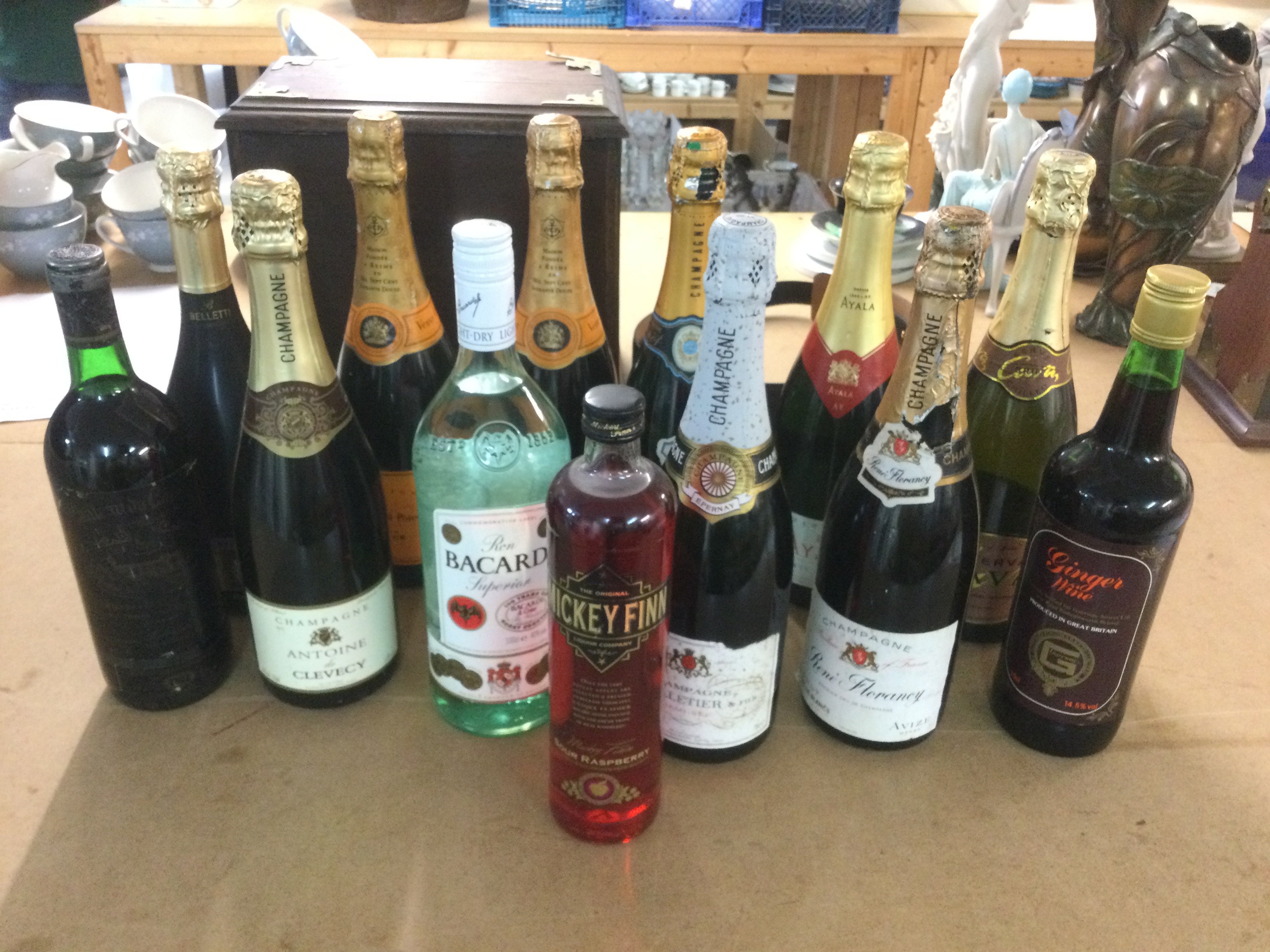 A collection of champagne and spirits. Shipping category D.