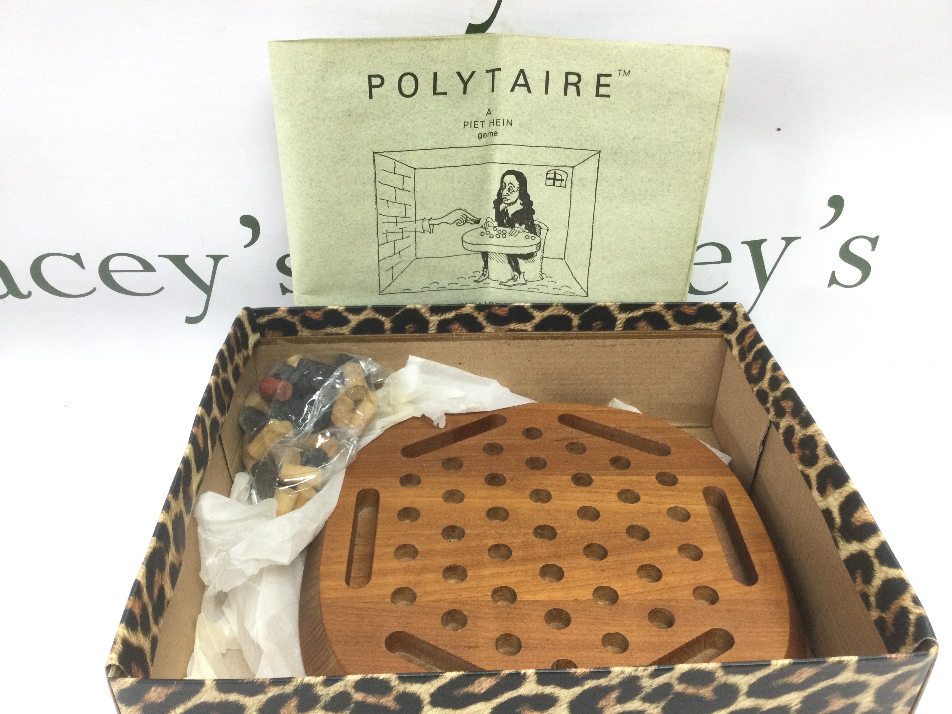 A Polytaire board game by Piet Hein. Shipping category B.
