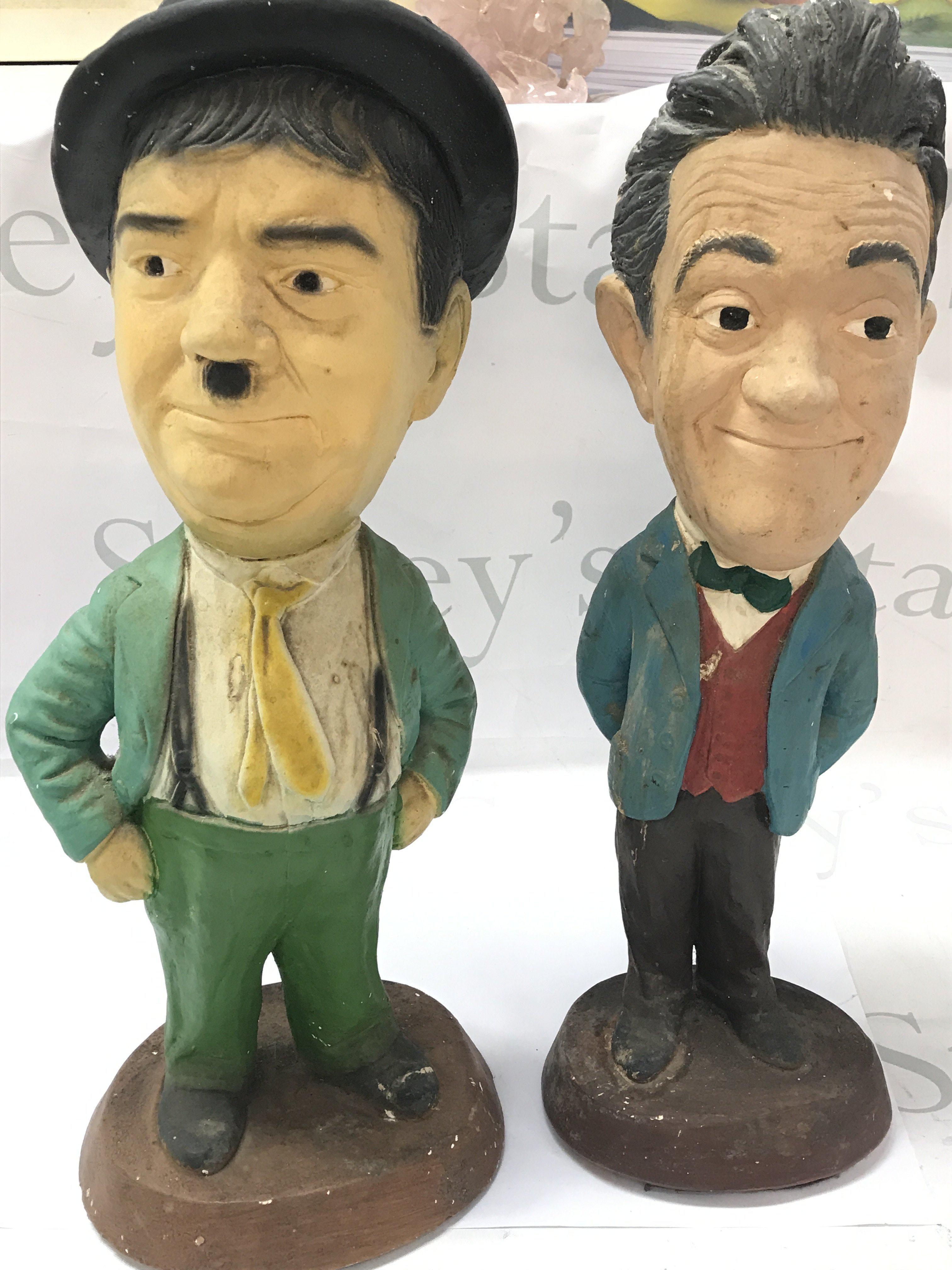 Laureen and hardy plaster figures , tallest 44cm. this lot cannot be posted