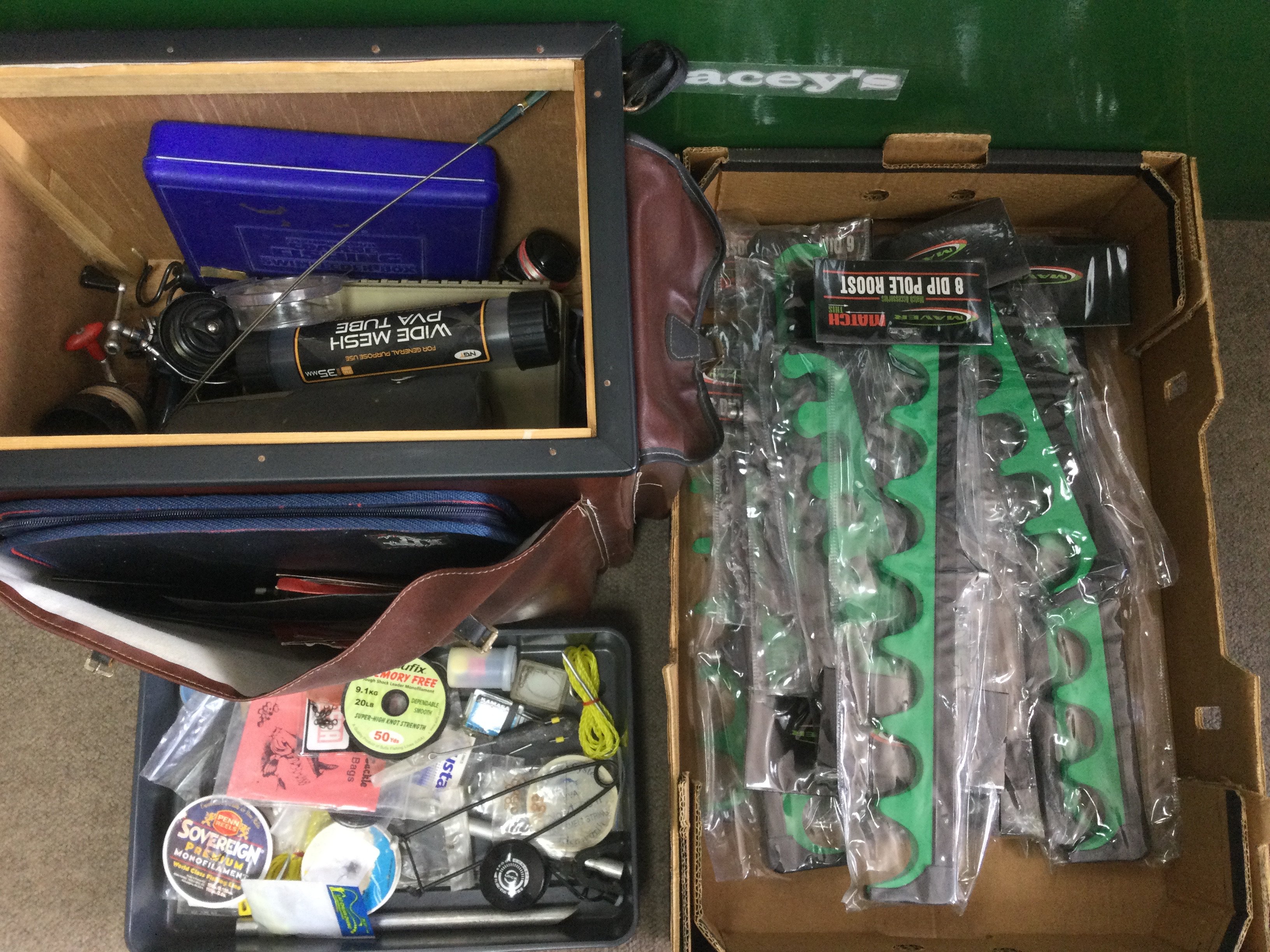 A collection of vintage fishing equipment including rods. Shipping category D.