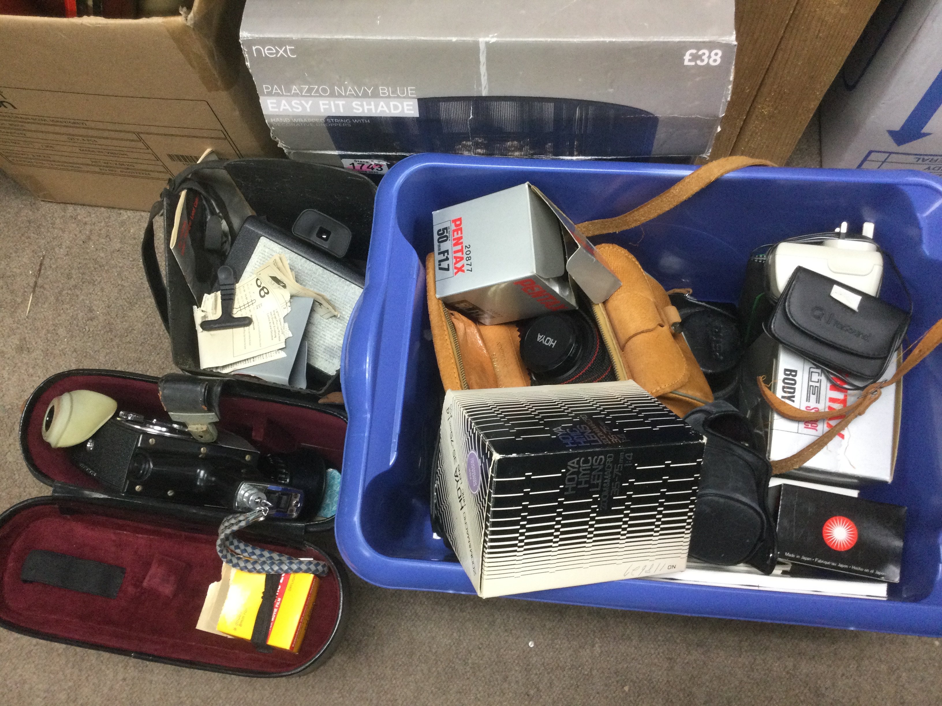 A collection of cameras and video cameras. Shipping category D.