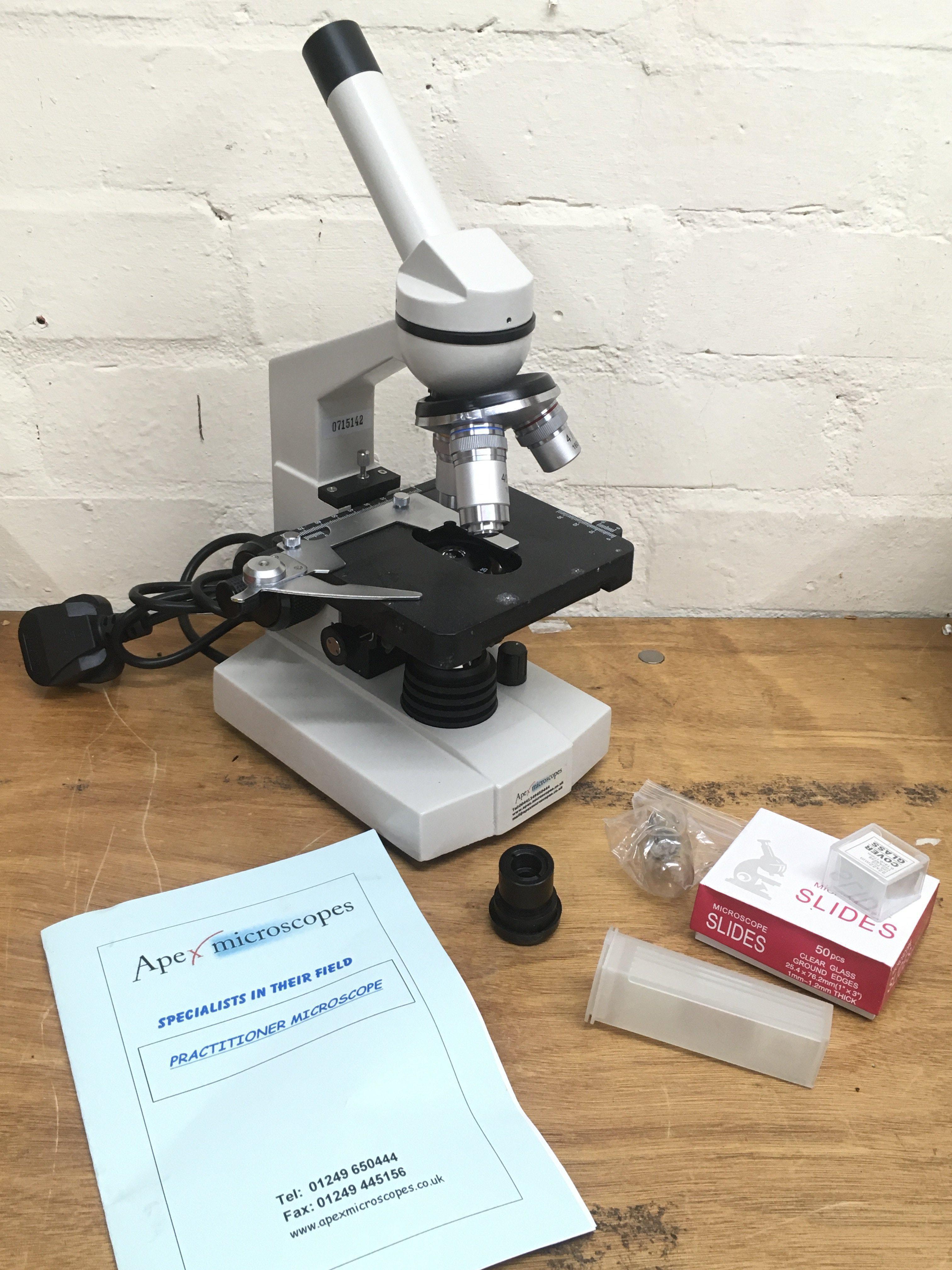An Apex Practitioner Microscope. Postage category C