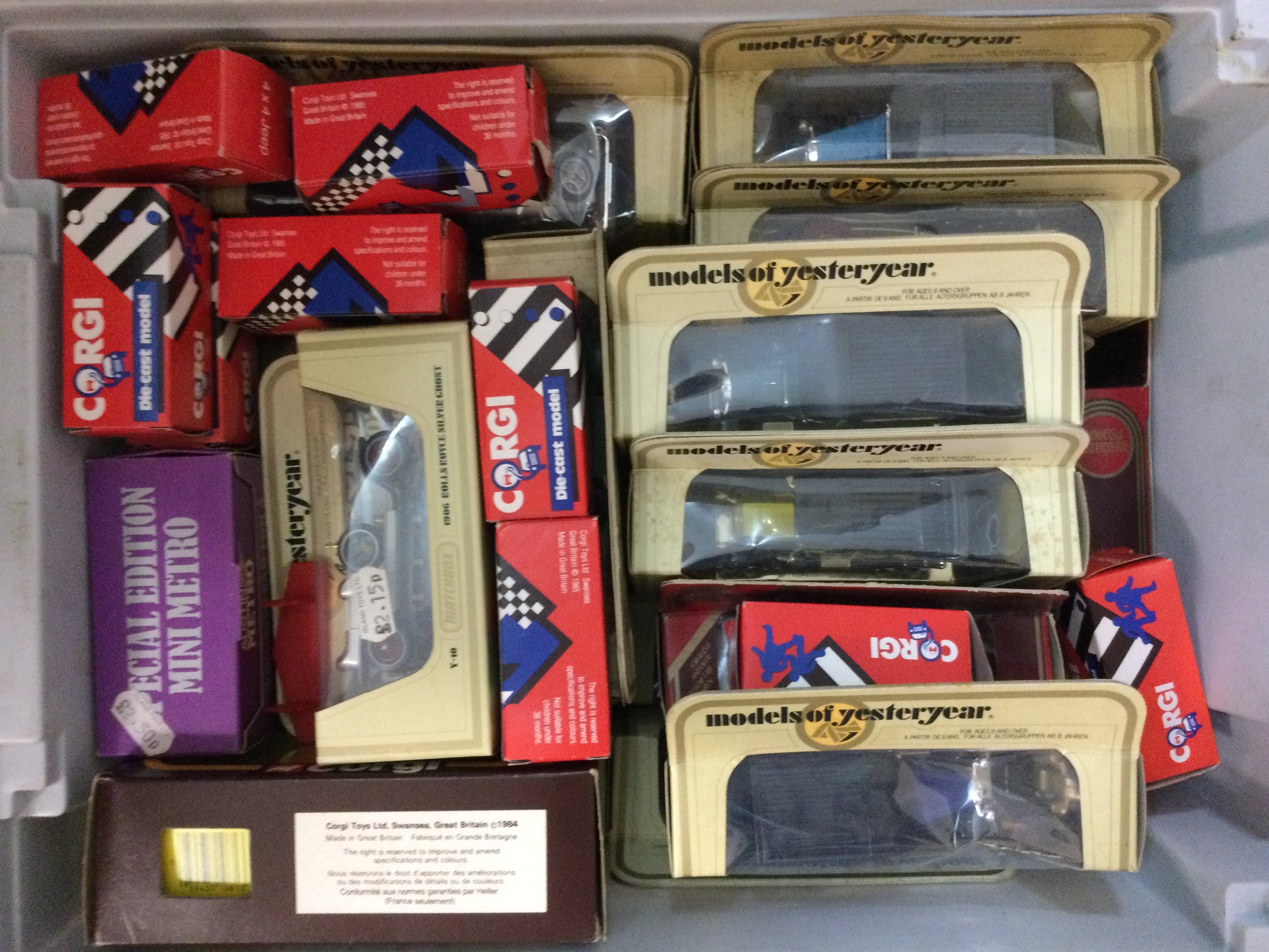 Four boxes of model cars including models of yesteryear various