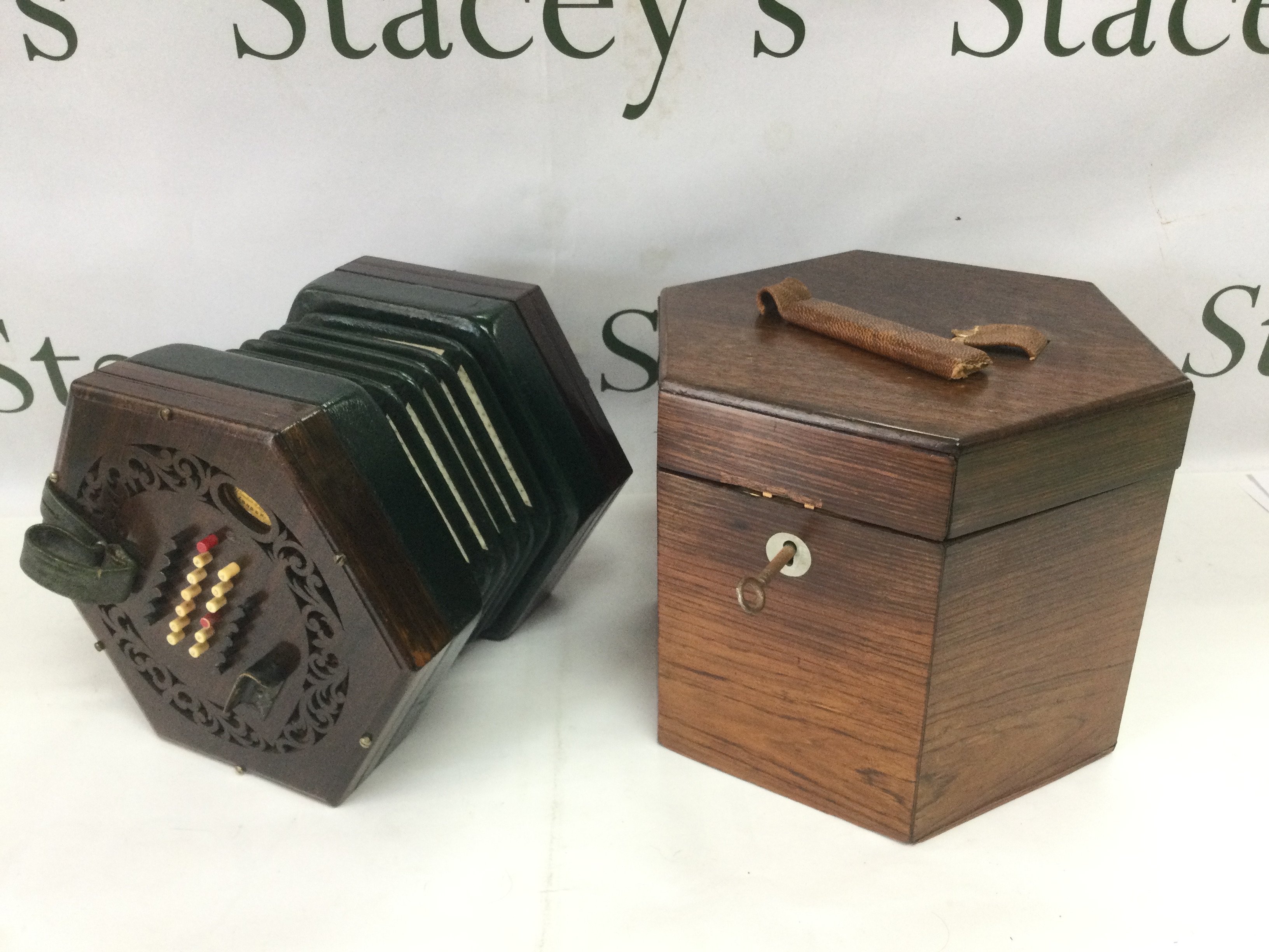 A C Wheatstone of London concertina with outer case. Shipping category D.