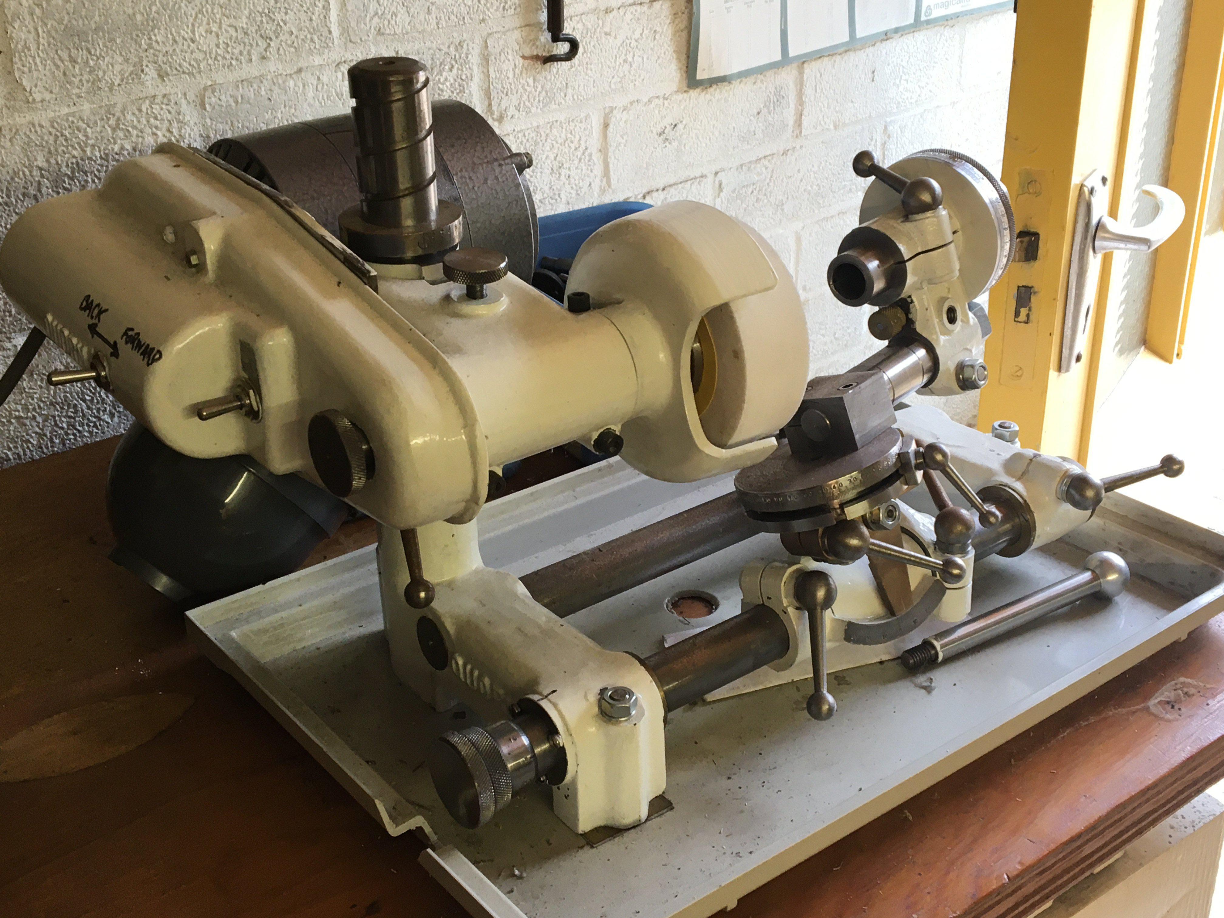 A small Quorn multi purpose bench top precision lathe and grinder with accessories forward and reverse gear switch good condition working order. Viewing by appointment sold in situ buyer to collect RM15 South Ockendon.