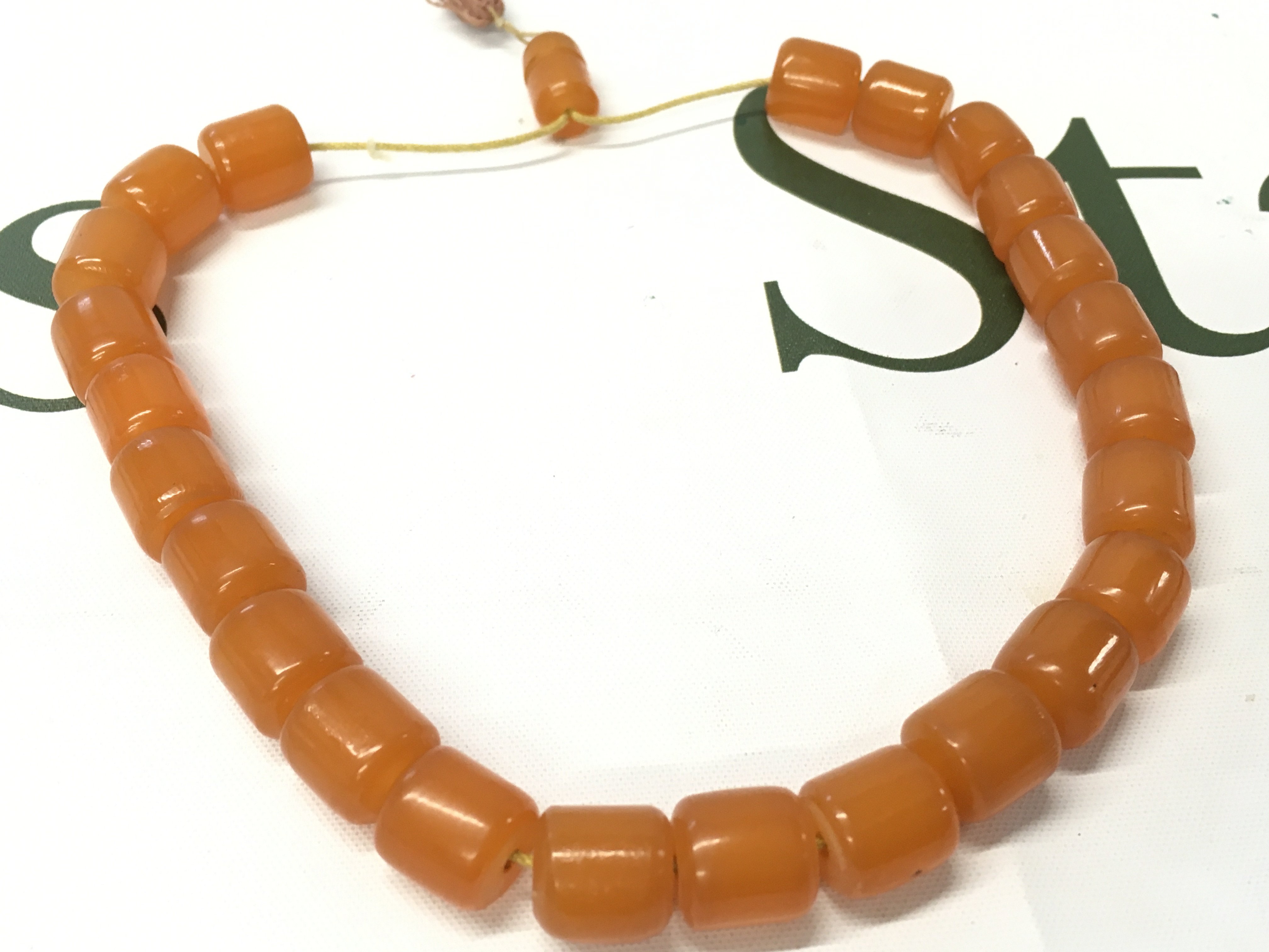 A bakelite prayers necklace , 36cm long. 45g total weight Approx .Postage category A