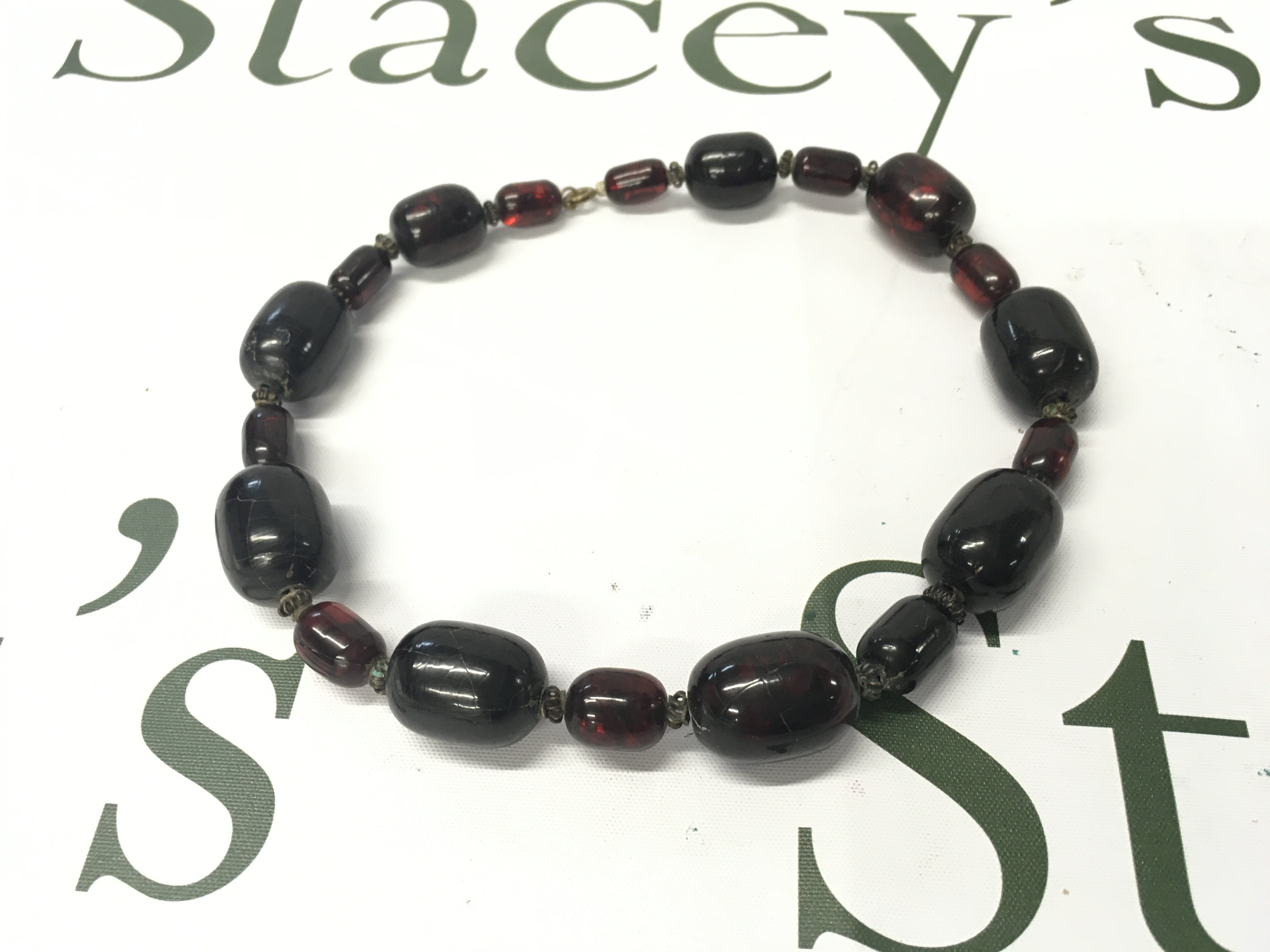 Cherry amber bakelite necklace , 43cm long and 68g weight postage category a