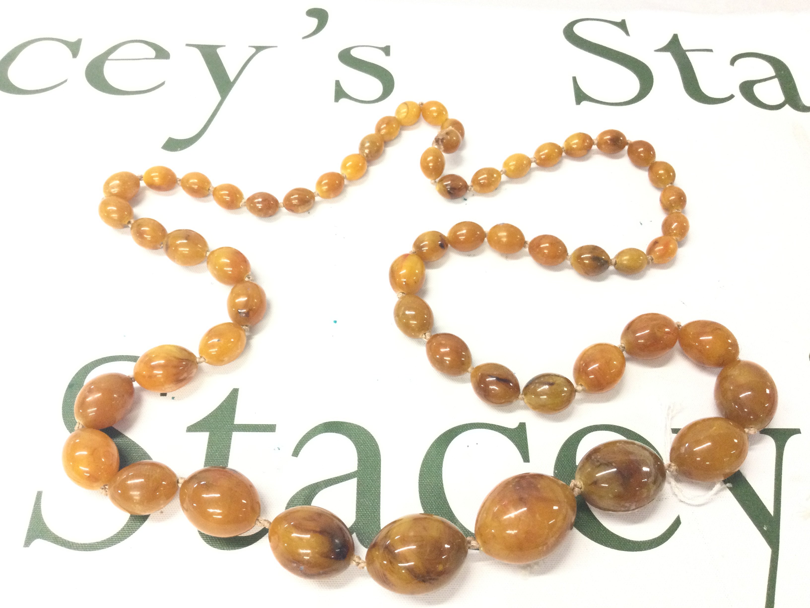 A Large Graduated Baltic Amber Necklace, 105cm 90g