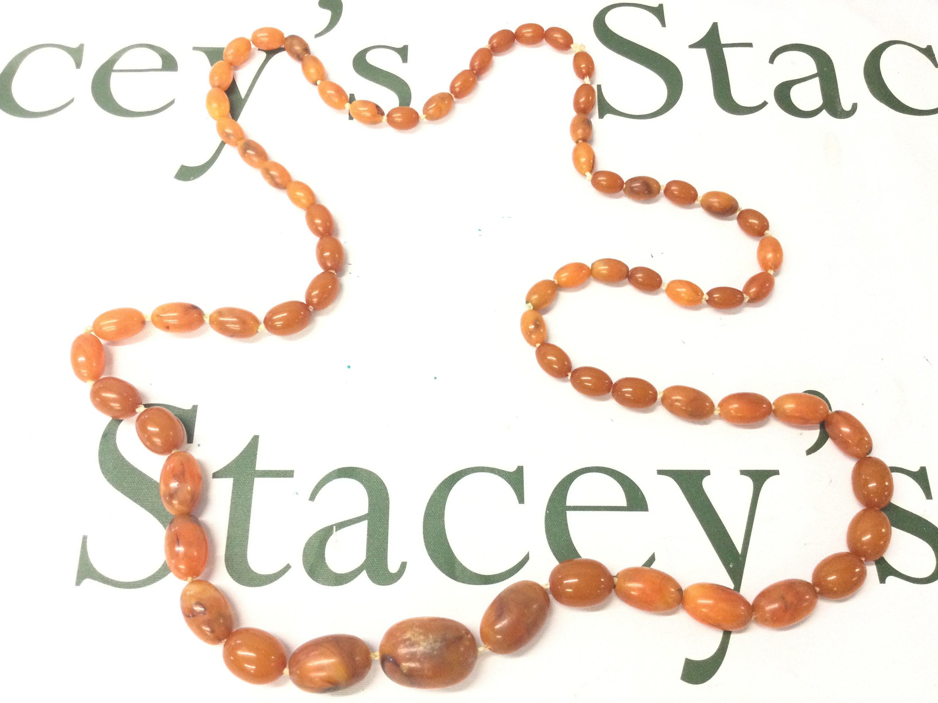 A Baltic Amber Necklace, 125cm 85g