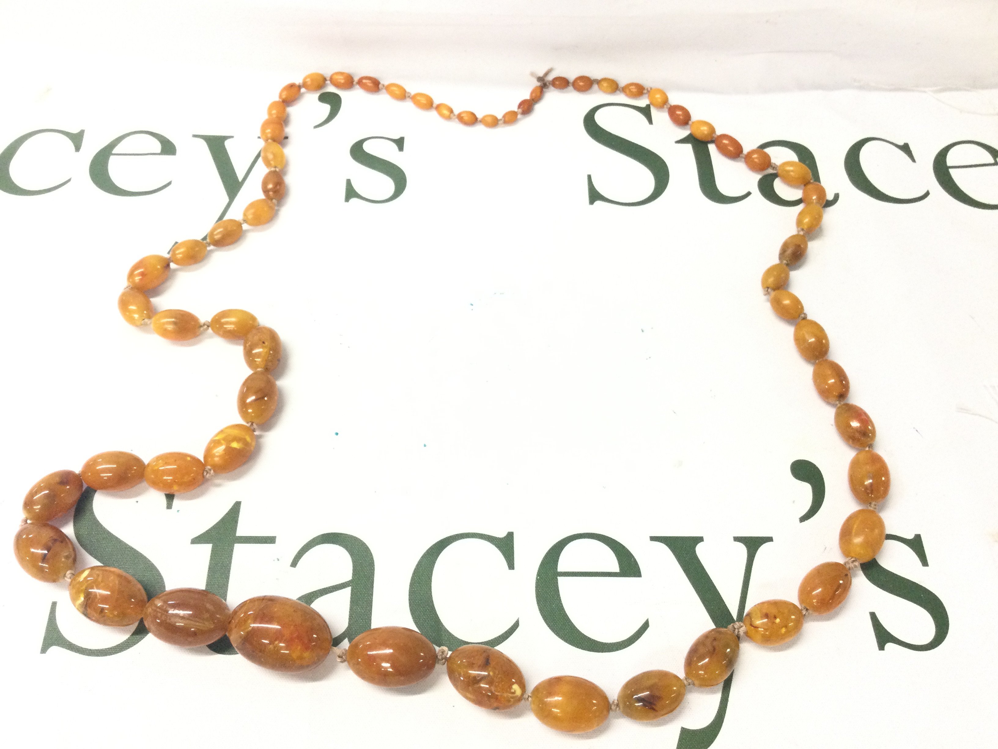 A Graduated Baltic Amber Necklace, 115cm 85g