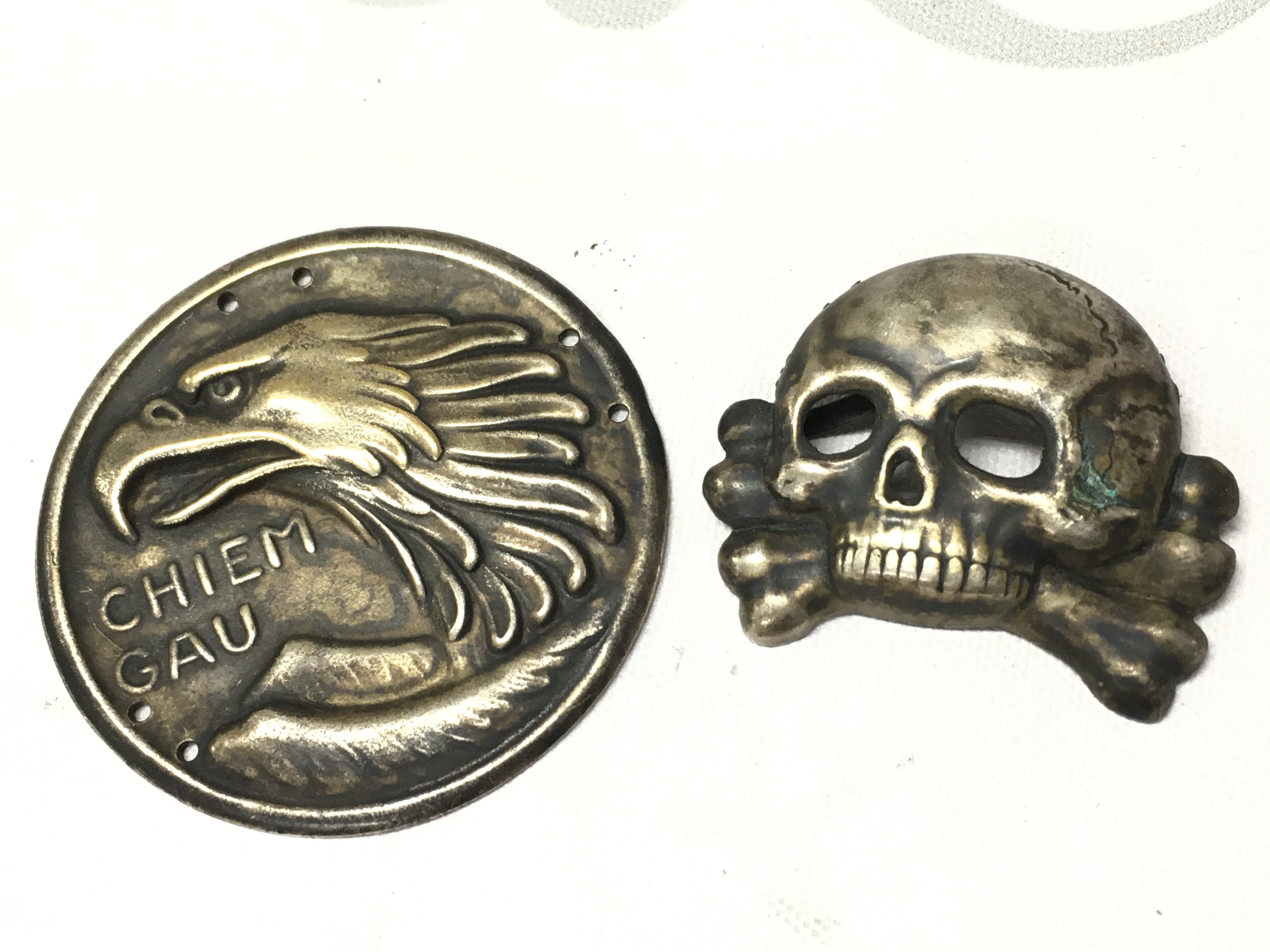 German Bavarian volunteer Freikorps medal and a SS skull hat badge . Postage category A