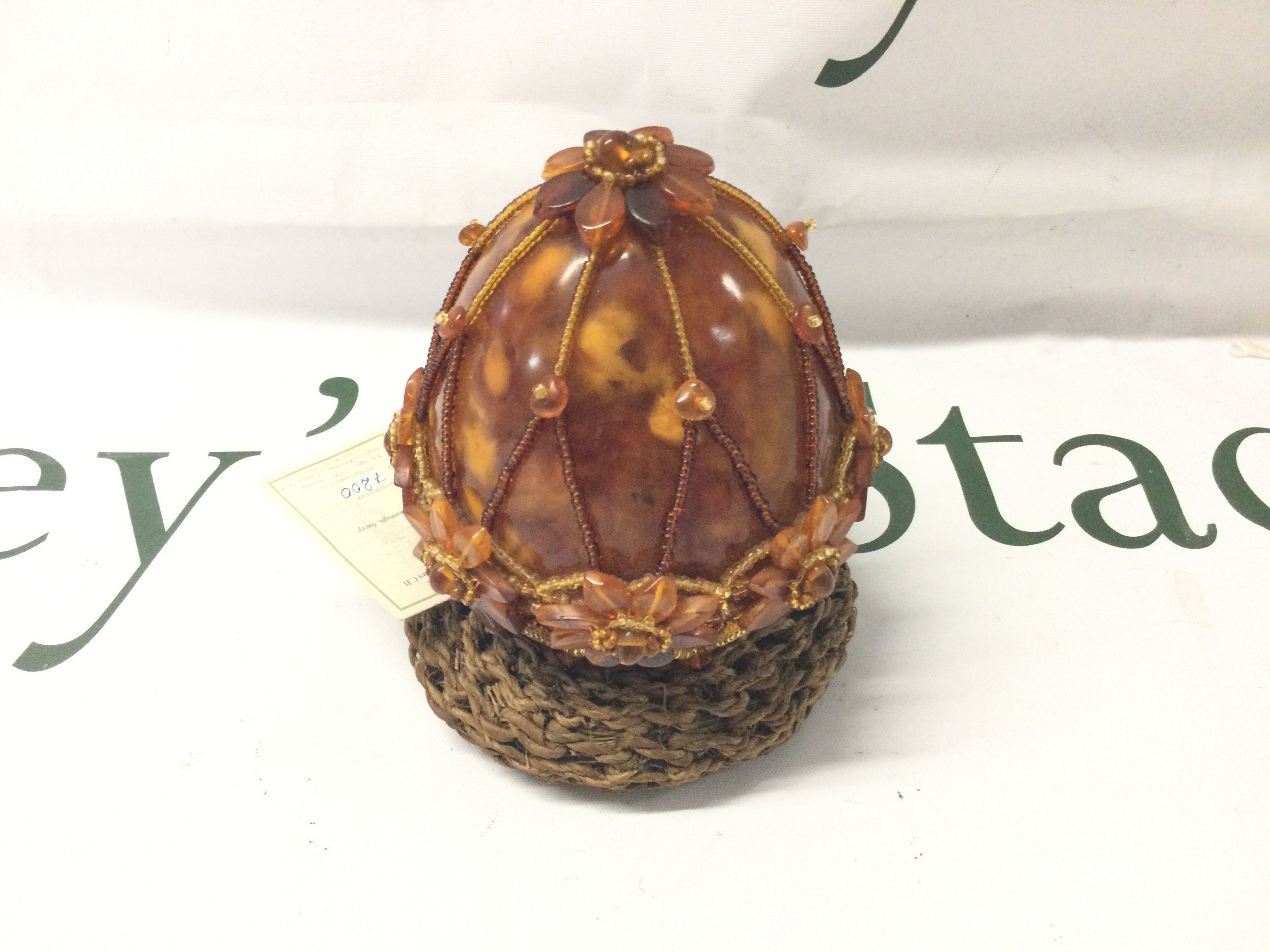 A Large Faberge Style Baltic Amber Egg, Made in the USSR, 140g