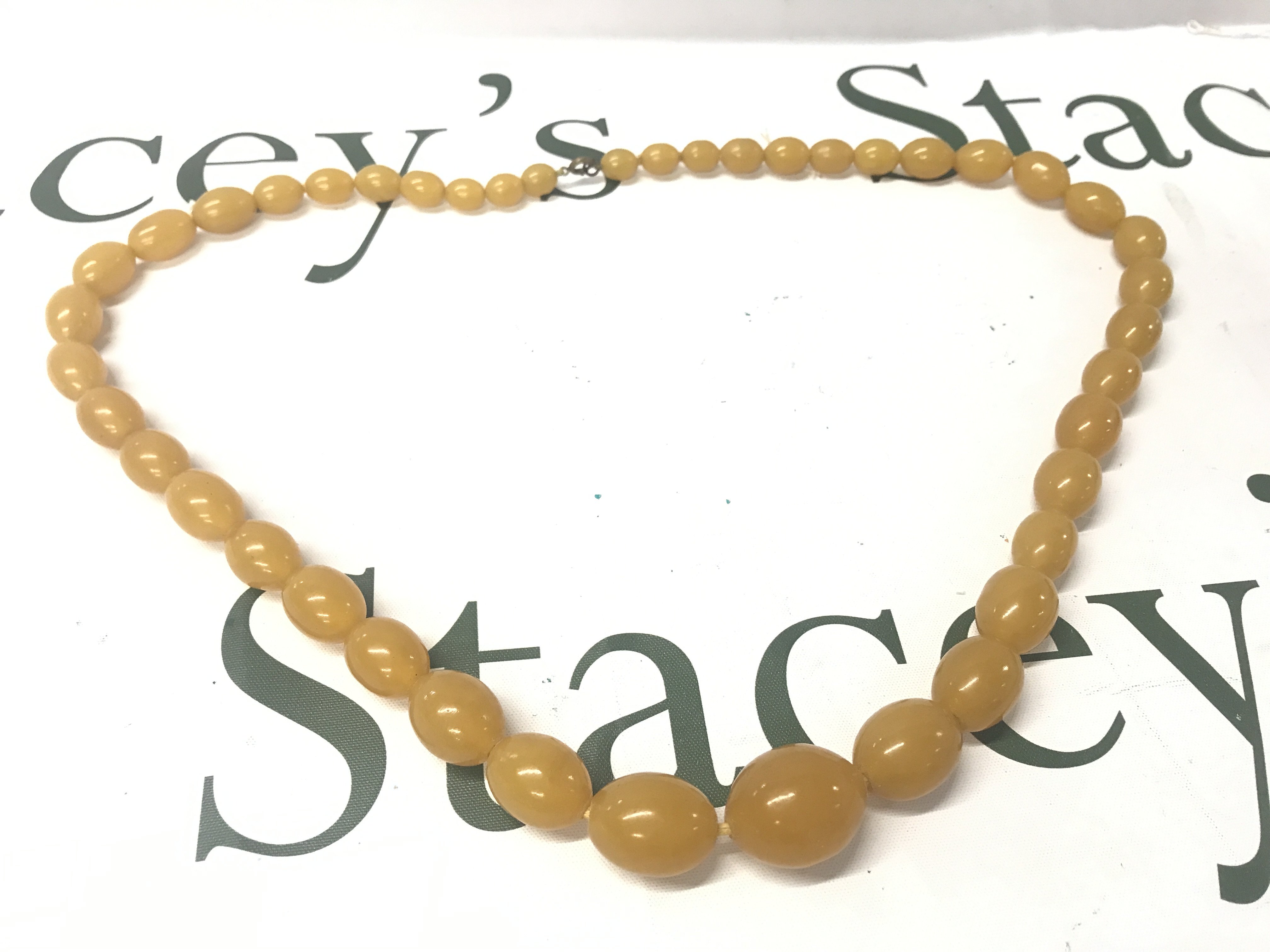 Butterscotch amber necklace , 80cm long. 113g Postage category A