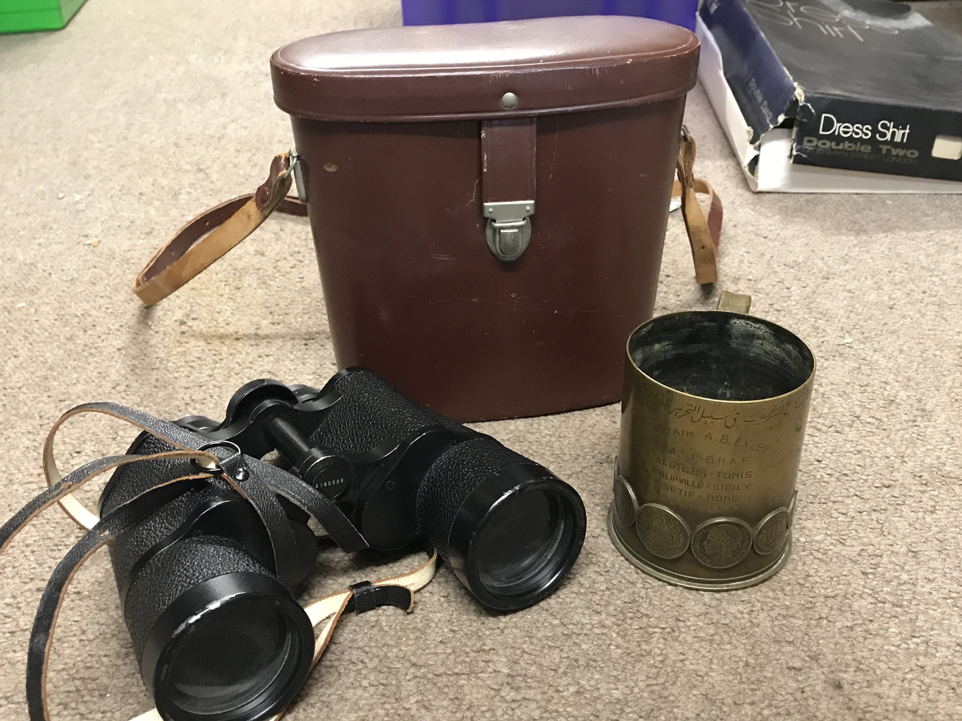 A WW2 trench art shell mug and a pair of Carl Zeiss 7x50 binoculars
