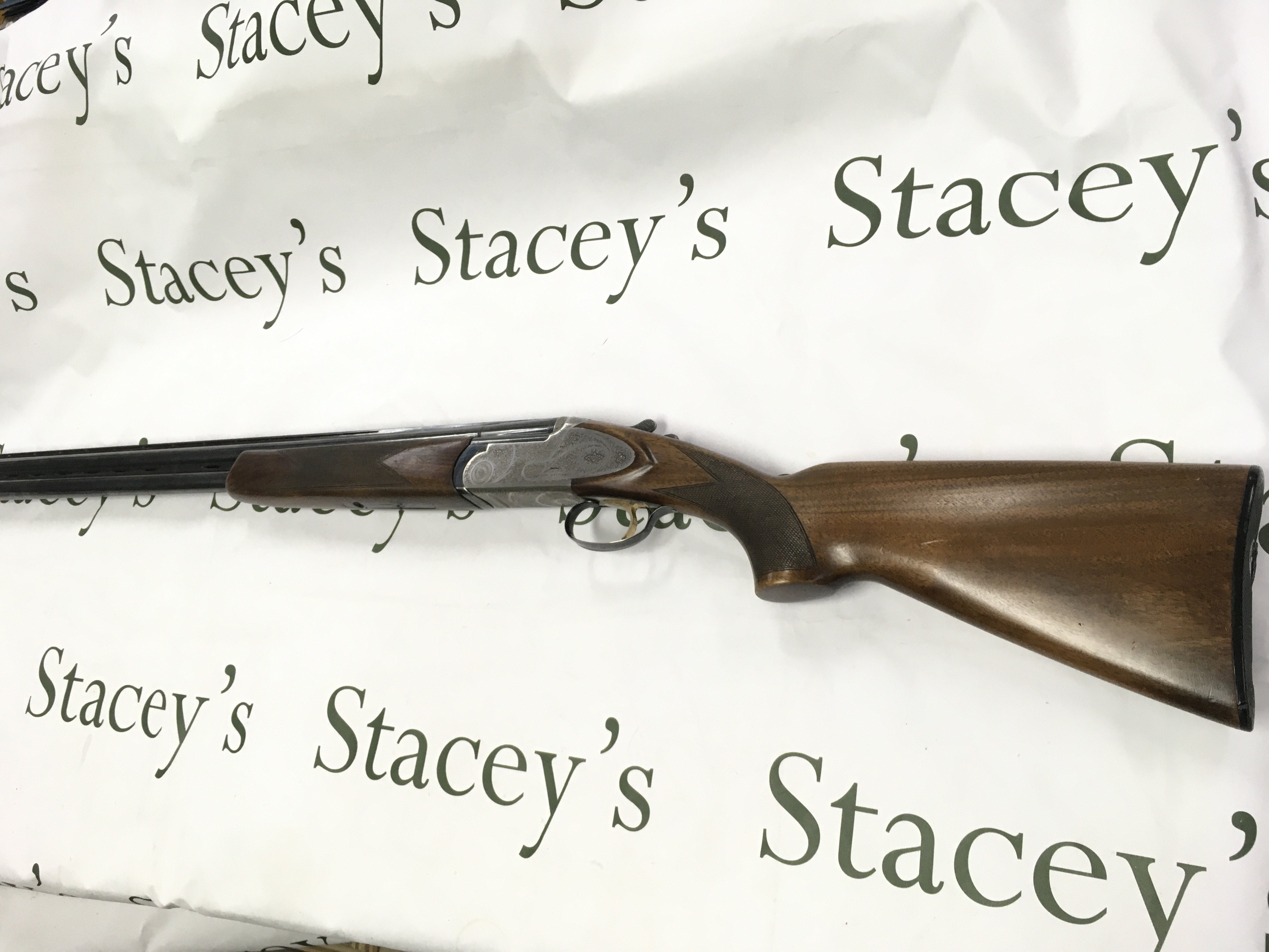 A 12 gauge over under shotgun by ARMI Bettinsoli. Single trigger multi choke. 28 barrel length and 44.5 inches overall. Serial number 63750 PLEASE NOTE THAT A SHOTGUN LICENSE IS REQUIRED TO PURCHASE THIS ITEM. COLLECTION AND VIEWING BY APPOINTMENT ONLY.