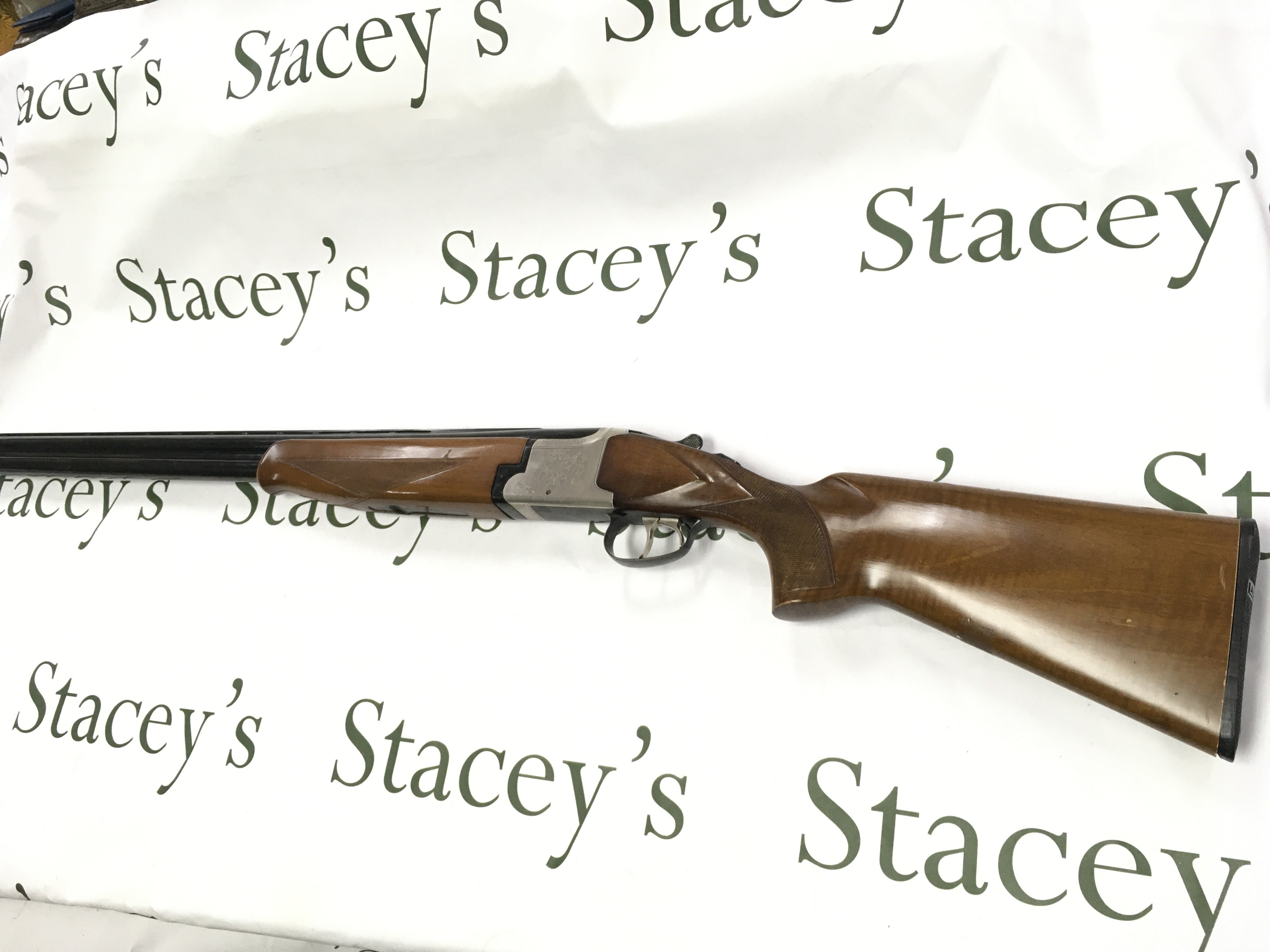 A Laurona 12g over under shotgun with ejectors and fixed chokes. 28inch barrels and 44 inches overall. Serial number 224300. PLEASE NOTE THAT A SHOTGUN LICENSE IS REQUIRED TO PURCHASE THIS ITEM. COLLECTION AND VIEWING BY APPOINTMENT ONLY.