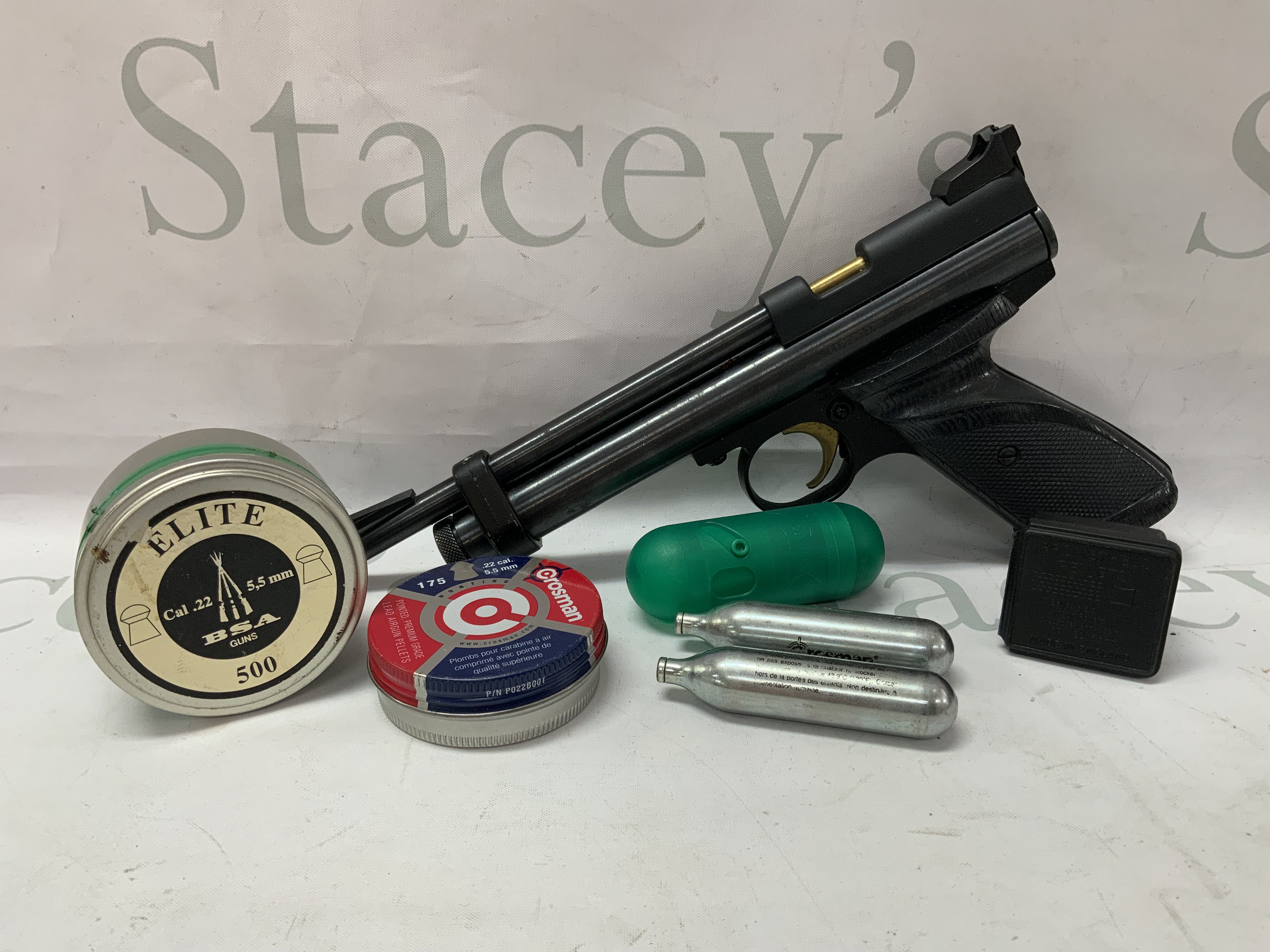 Crosman 2240 CO2 Bolt Action Air Pistol (.22 caliber) Together with additional items.