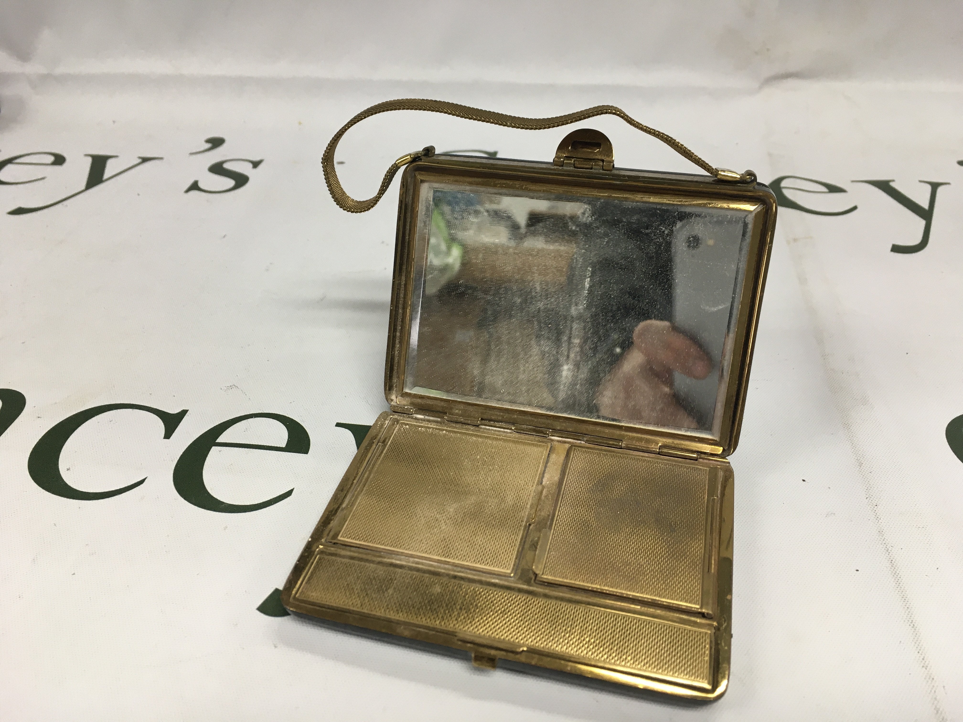 An unusual vintage bag compact. NO RESERVE