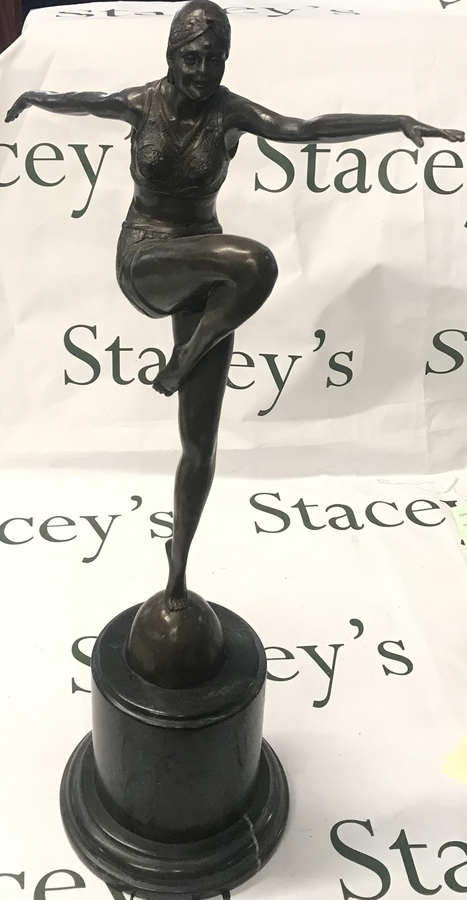 A large bronze art deco dancing lady , 58cm tall.