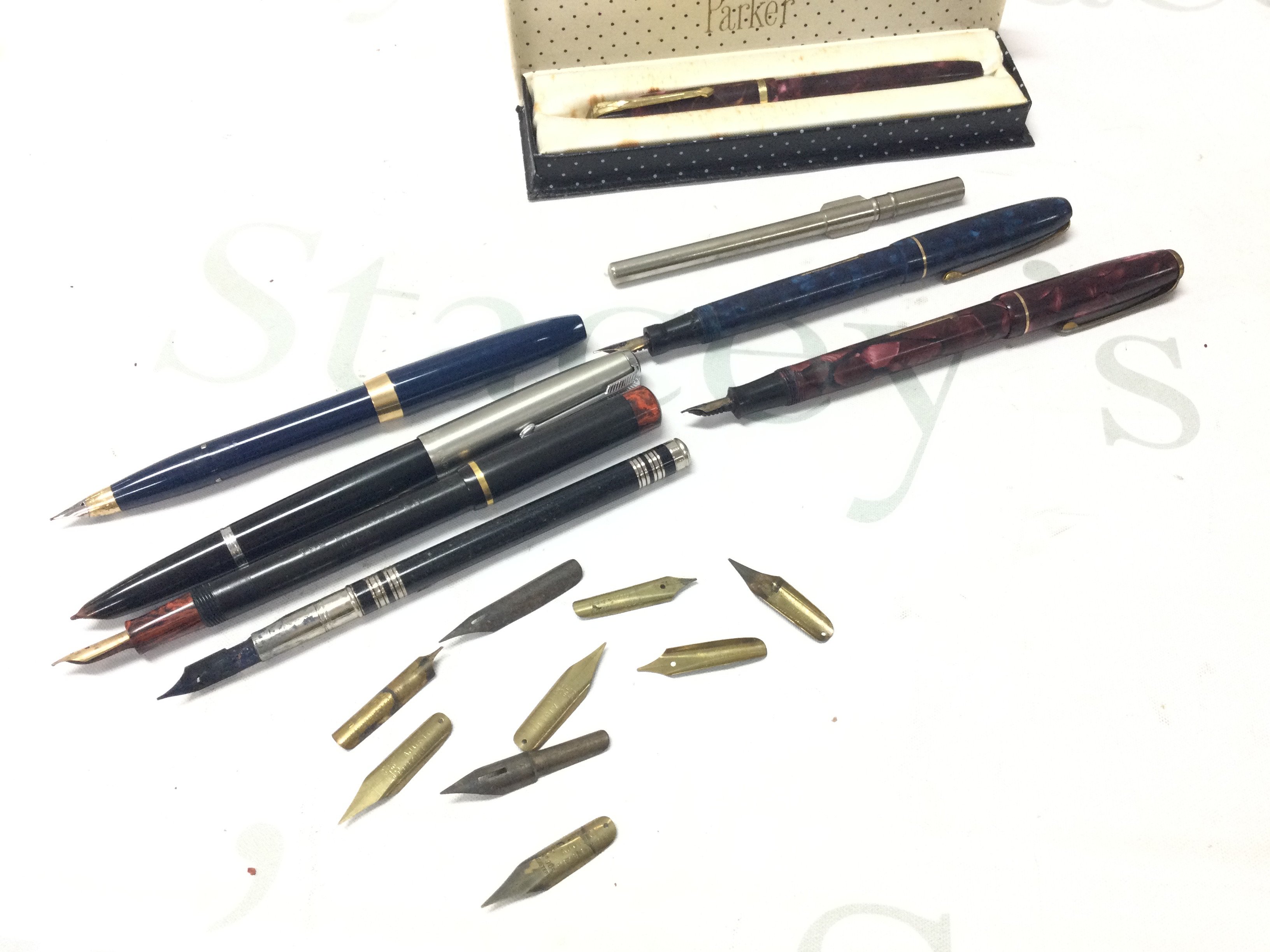 A collection of assorted pens including Parker and Sheaffers etc Postage B