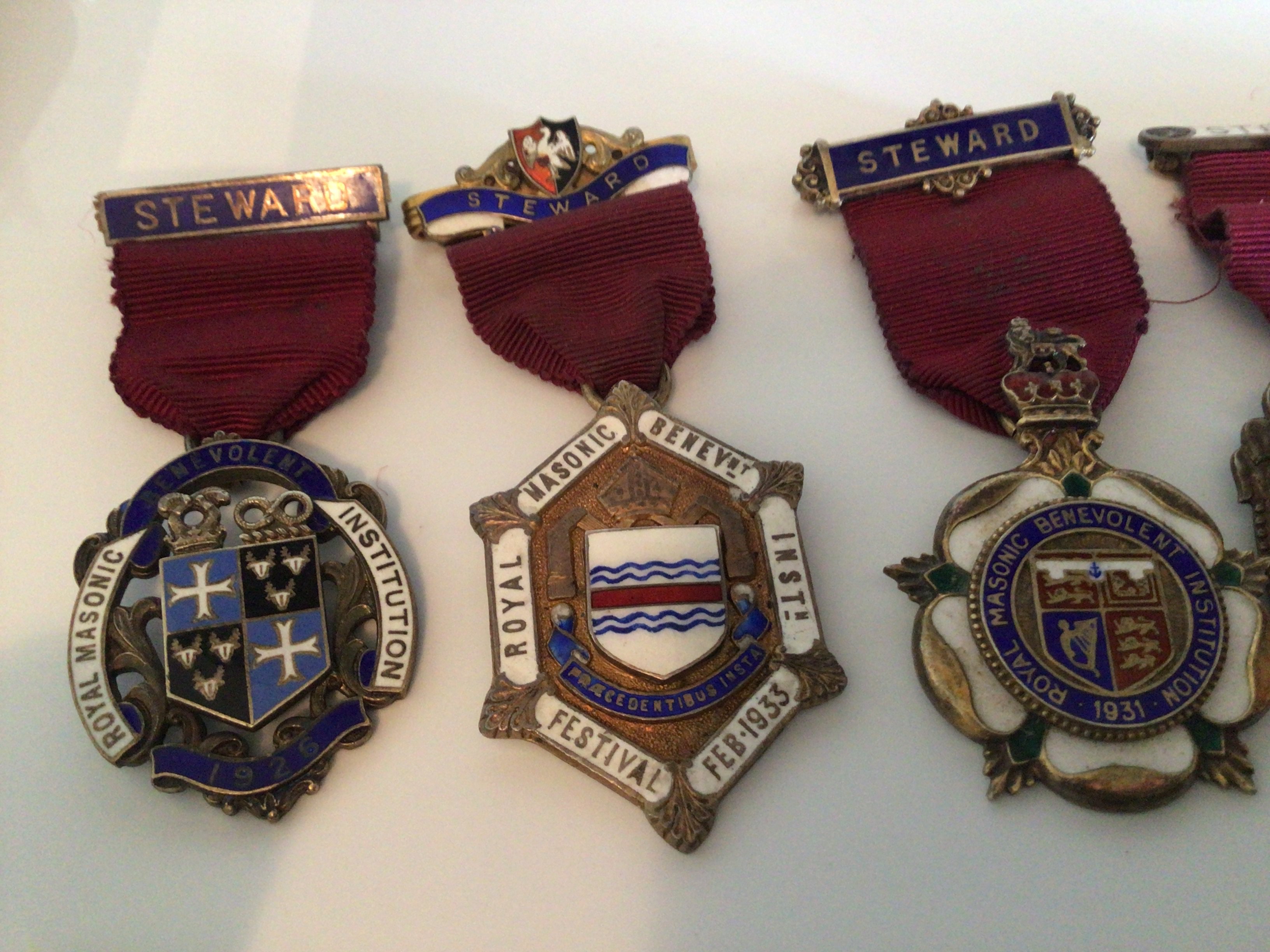 A collection of eight silver and enamel Stewards Jewels with dates of 1919 and other dates 1920-30. (8)- NO RESERVE