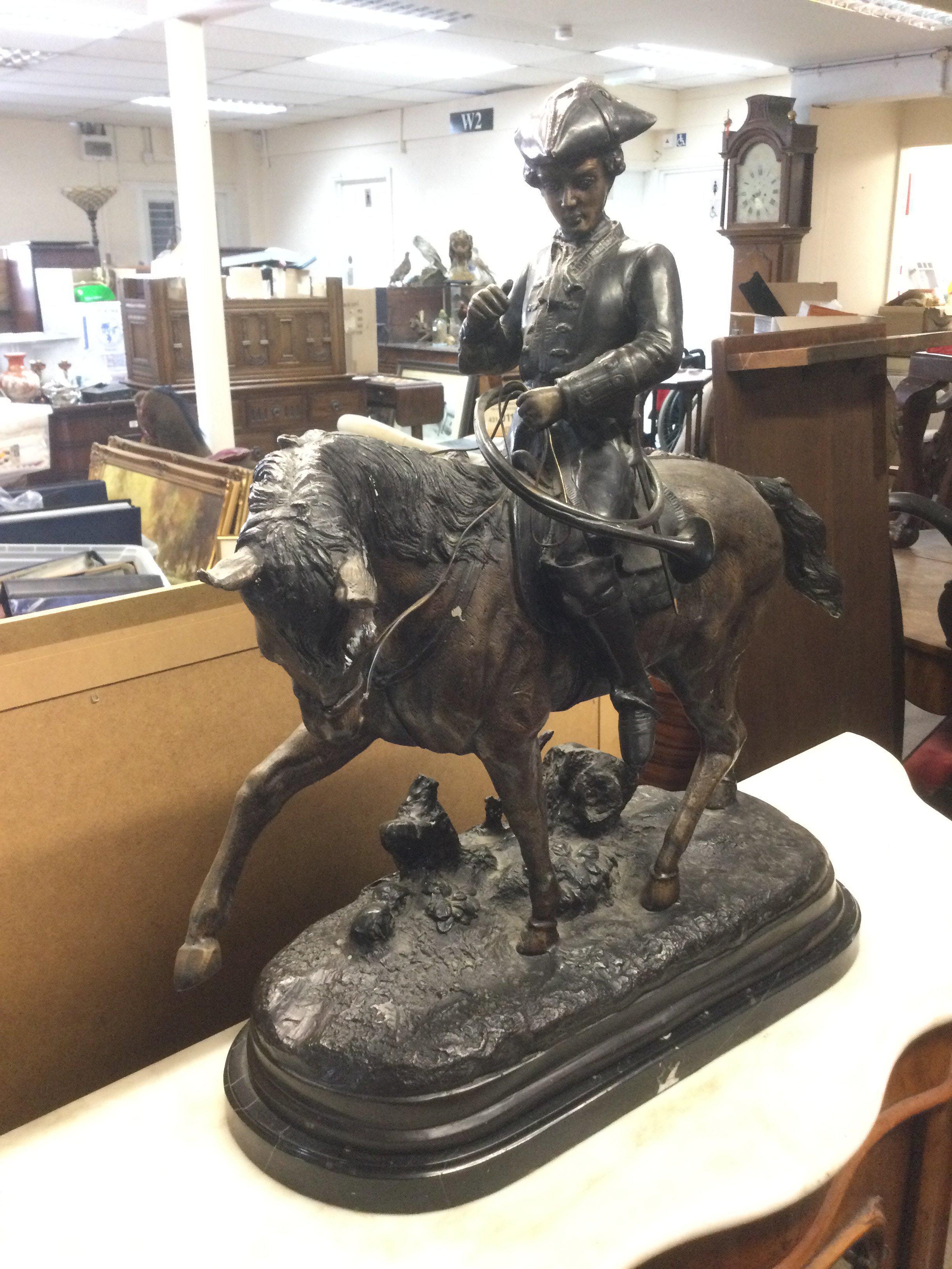A 20th Century bronze figure of gentleman in 18th Century style costume on horseback, approx height 62cm. Shipping category D.