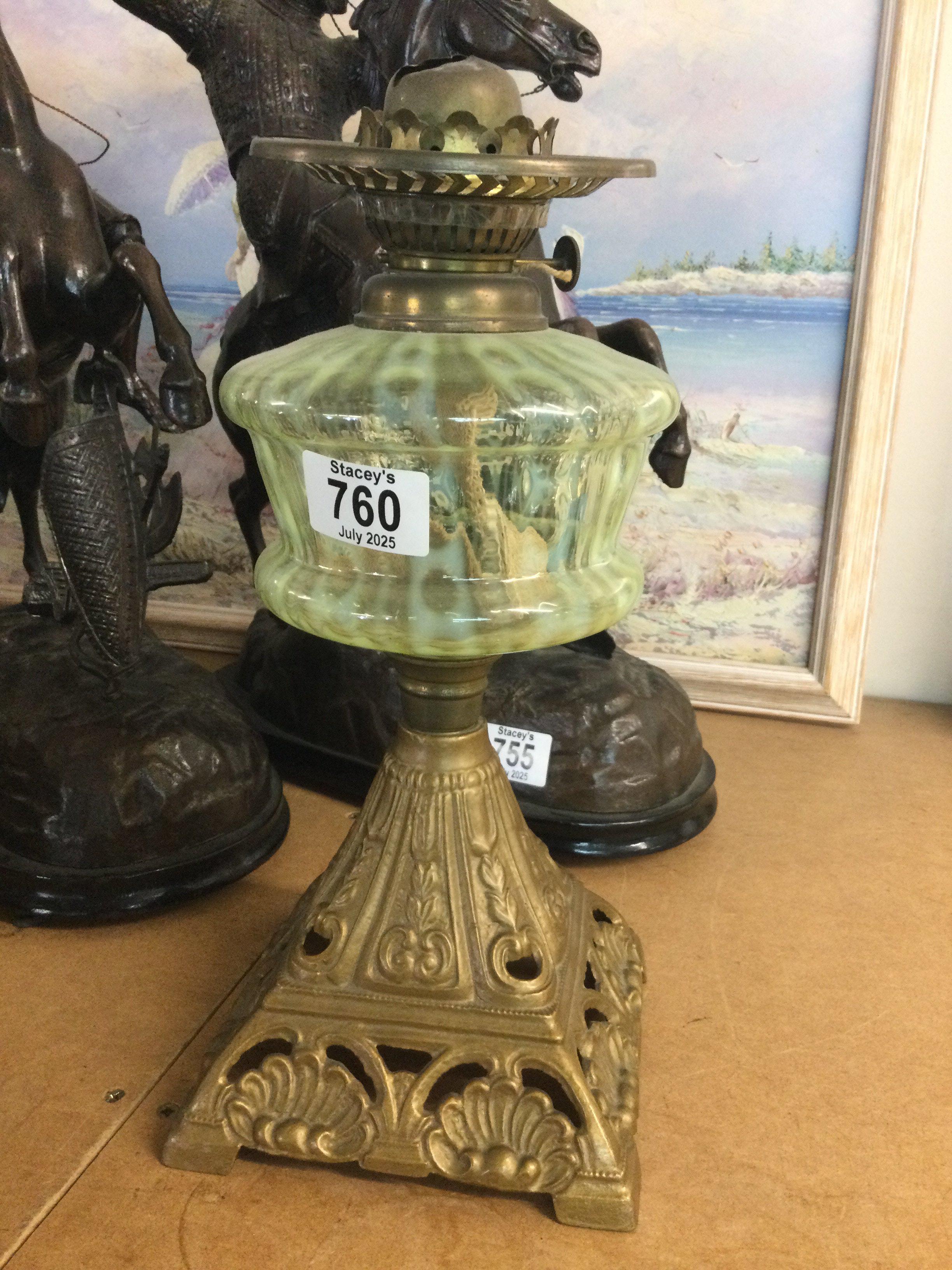 A Edwardian oil lamp with opaque font .