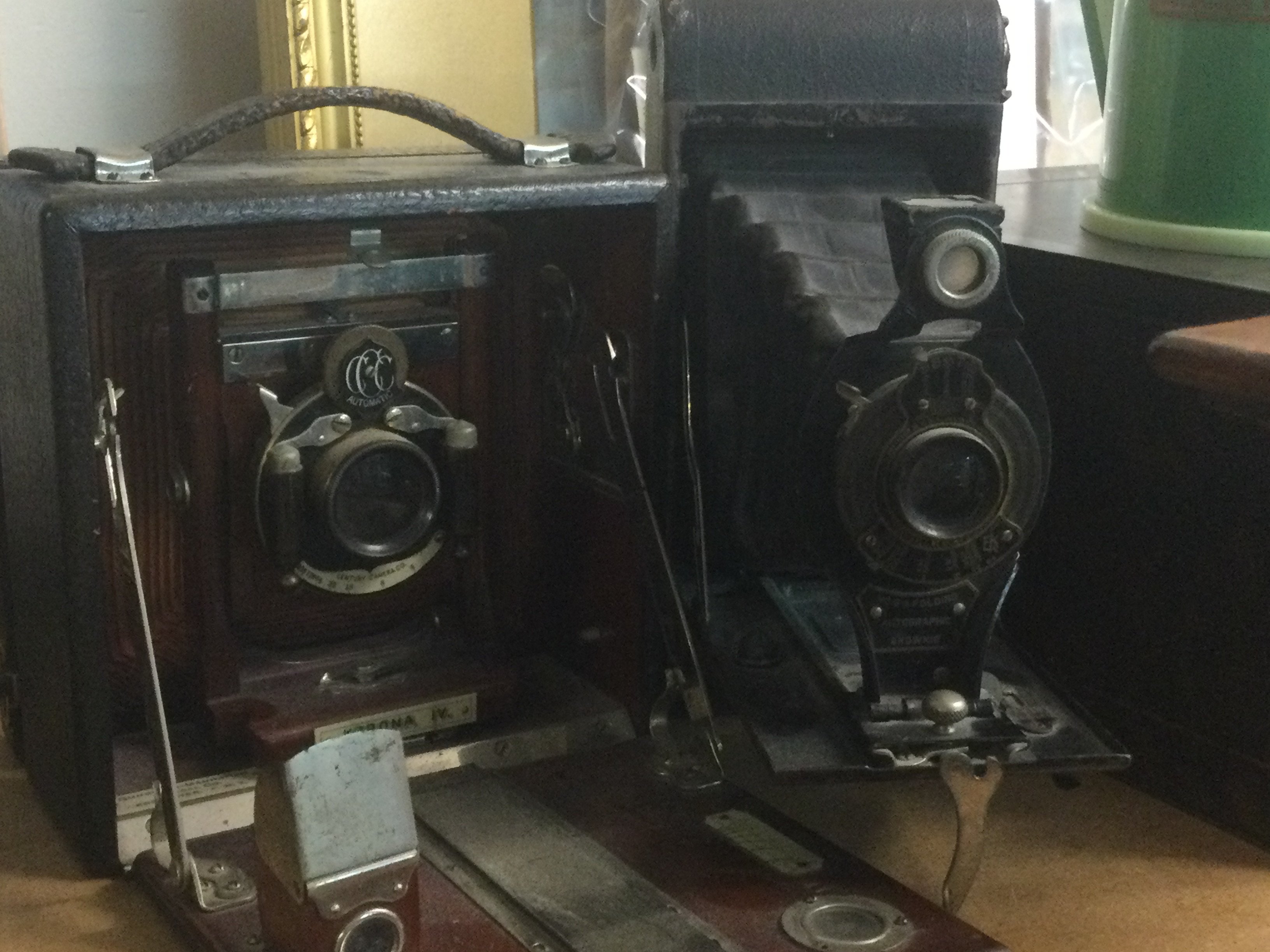 Two folding cameras.