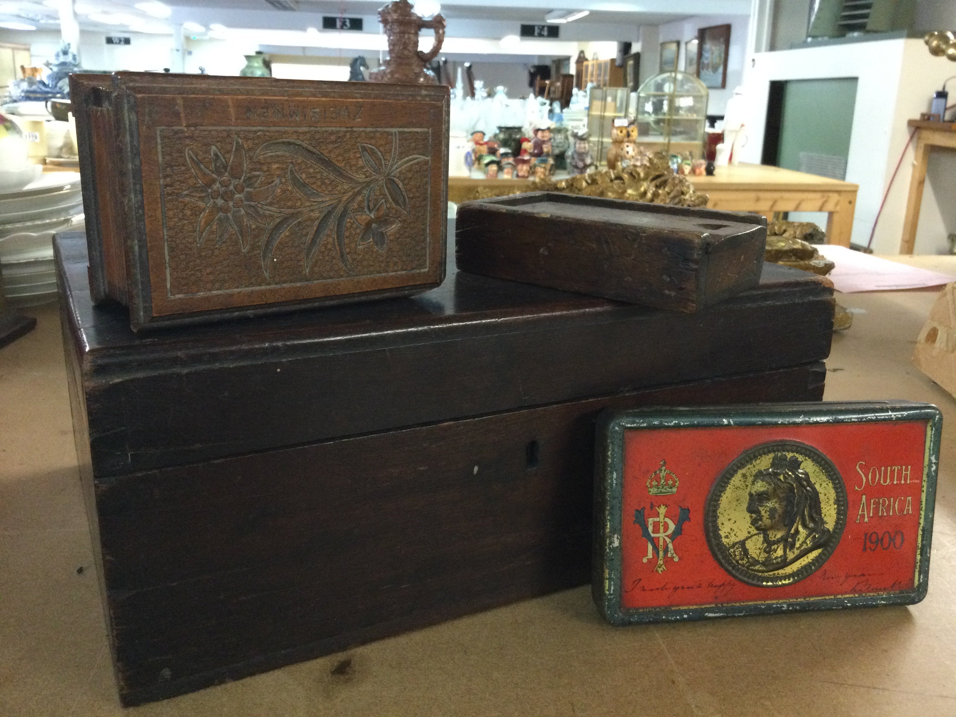 A mahogany writing box, with other small boxes and a 1900 Soth Africa Tin
