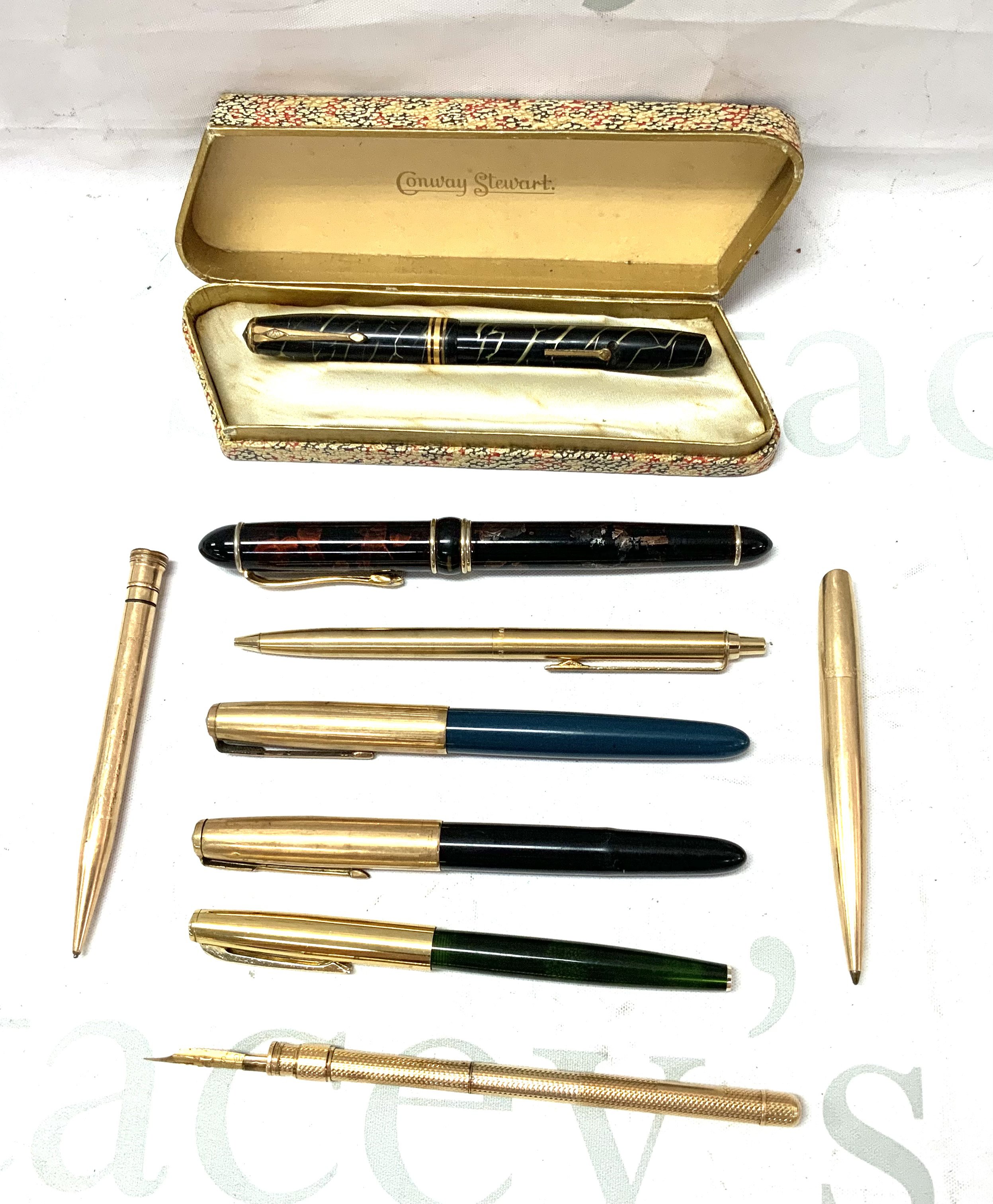 A good collection of vintage and antique pens to include a Boxed Conway Stewart cracked Ice fountain pen, Marie Todd gold plated propelling pencil and pen, 2 vintage Parker fountain pens, Parker biro etc